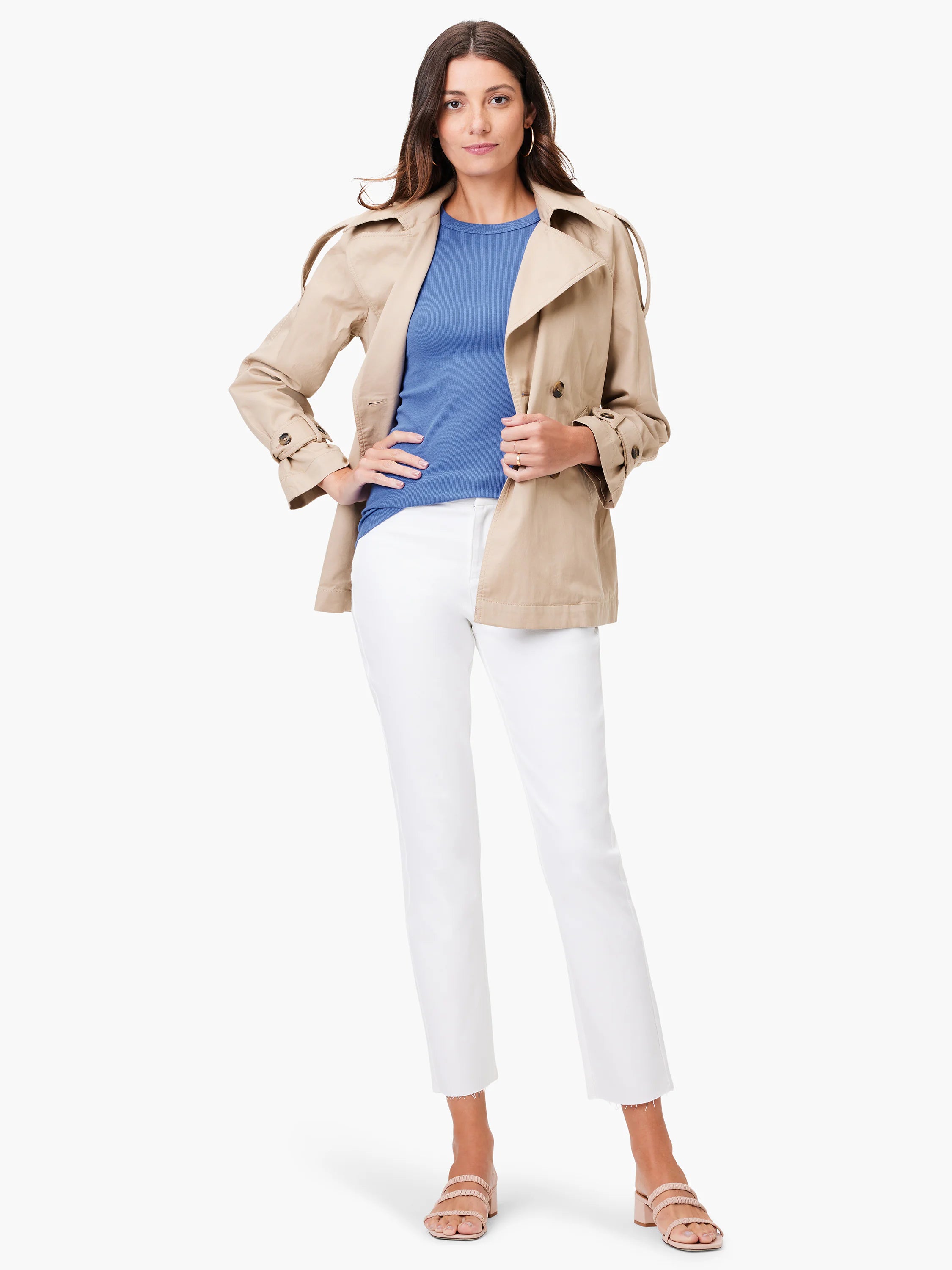 Blue ribbed short-sleeve crew neck tee, visible under a tan trench coat.