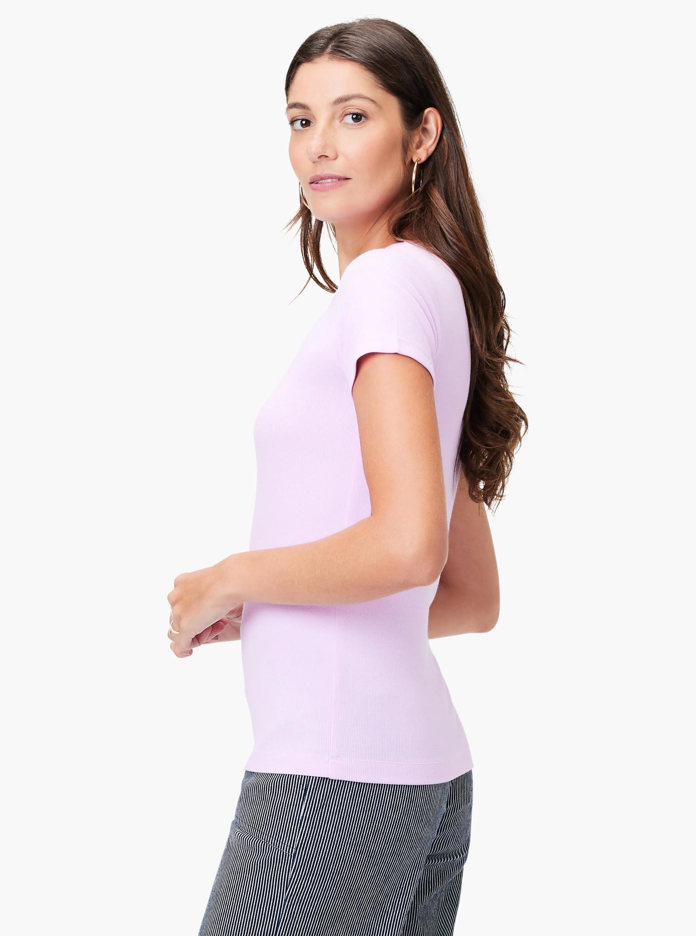 Pale pink, ribbed knit short sleeve crew tee, close-fitting.
