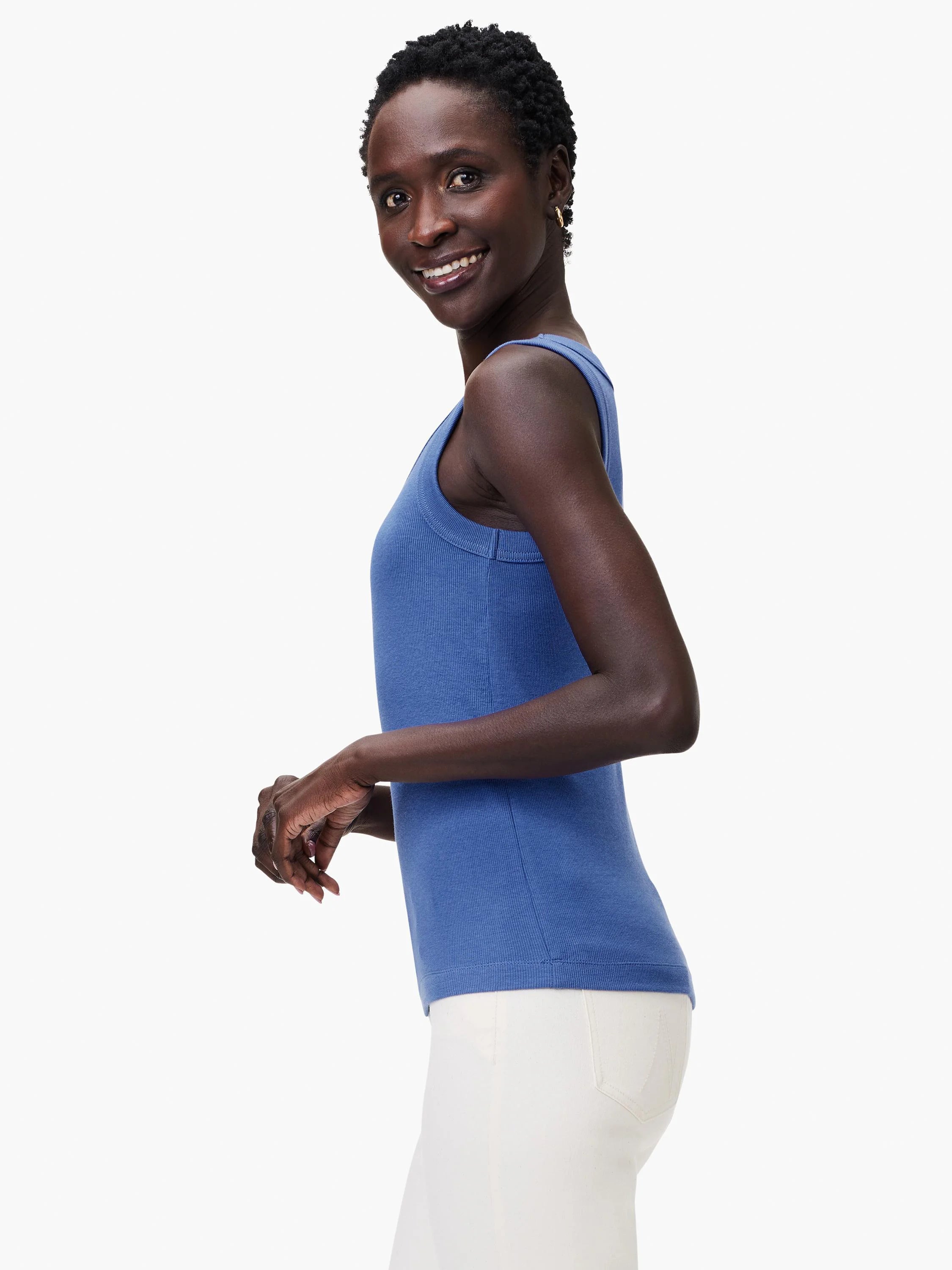 Blue ribbed knit scoop neck tank top on a model.