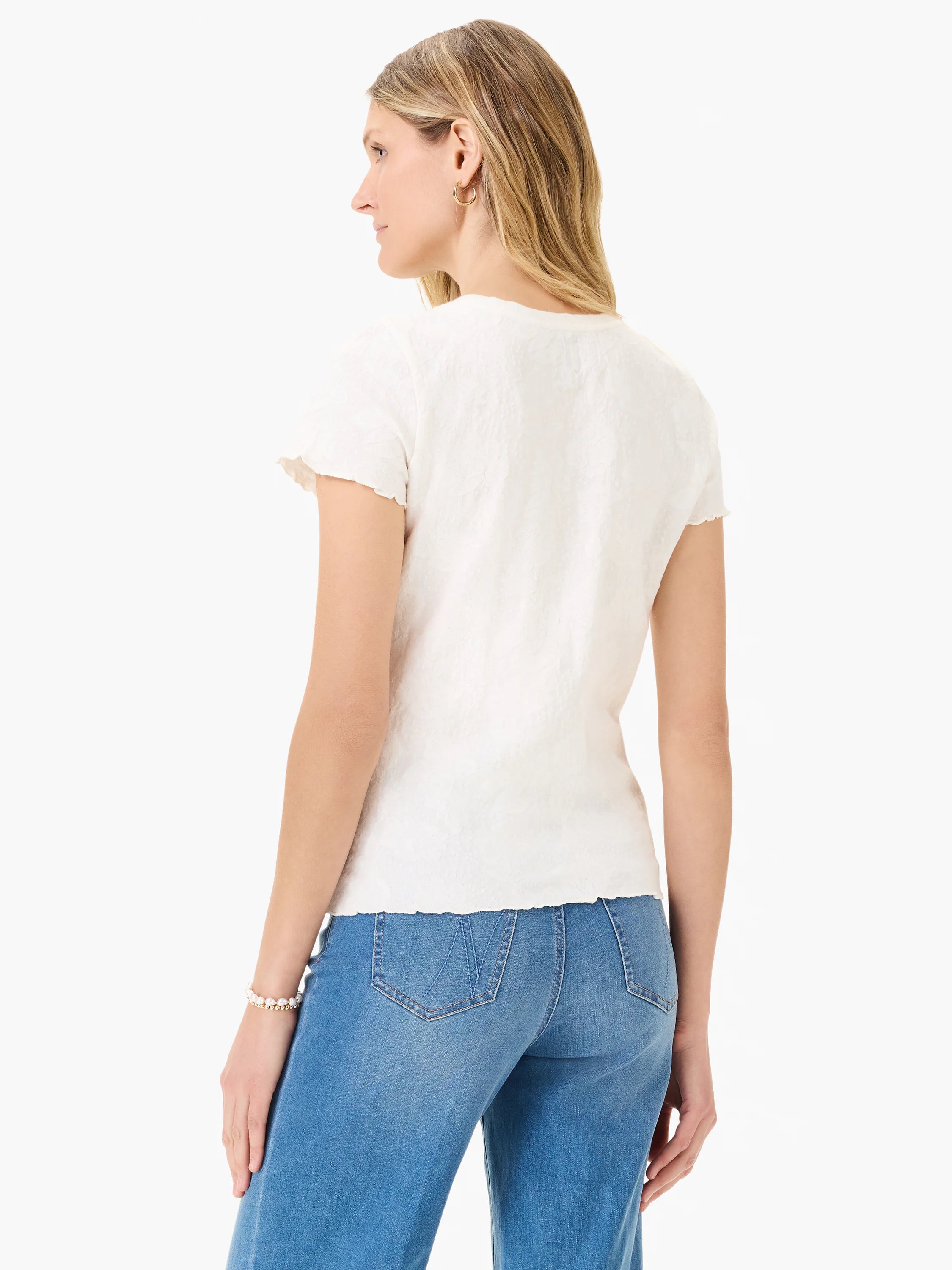 Off-white lace-knit t-shirt with short, scalloped sleeves. The shirt has a textured appearance.