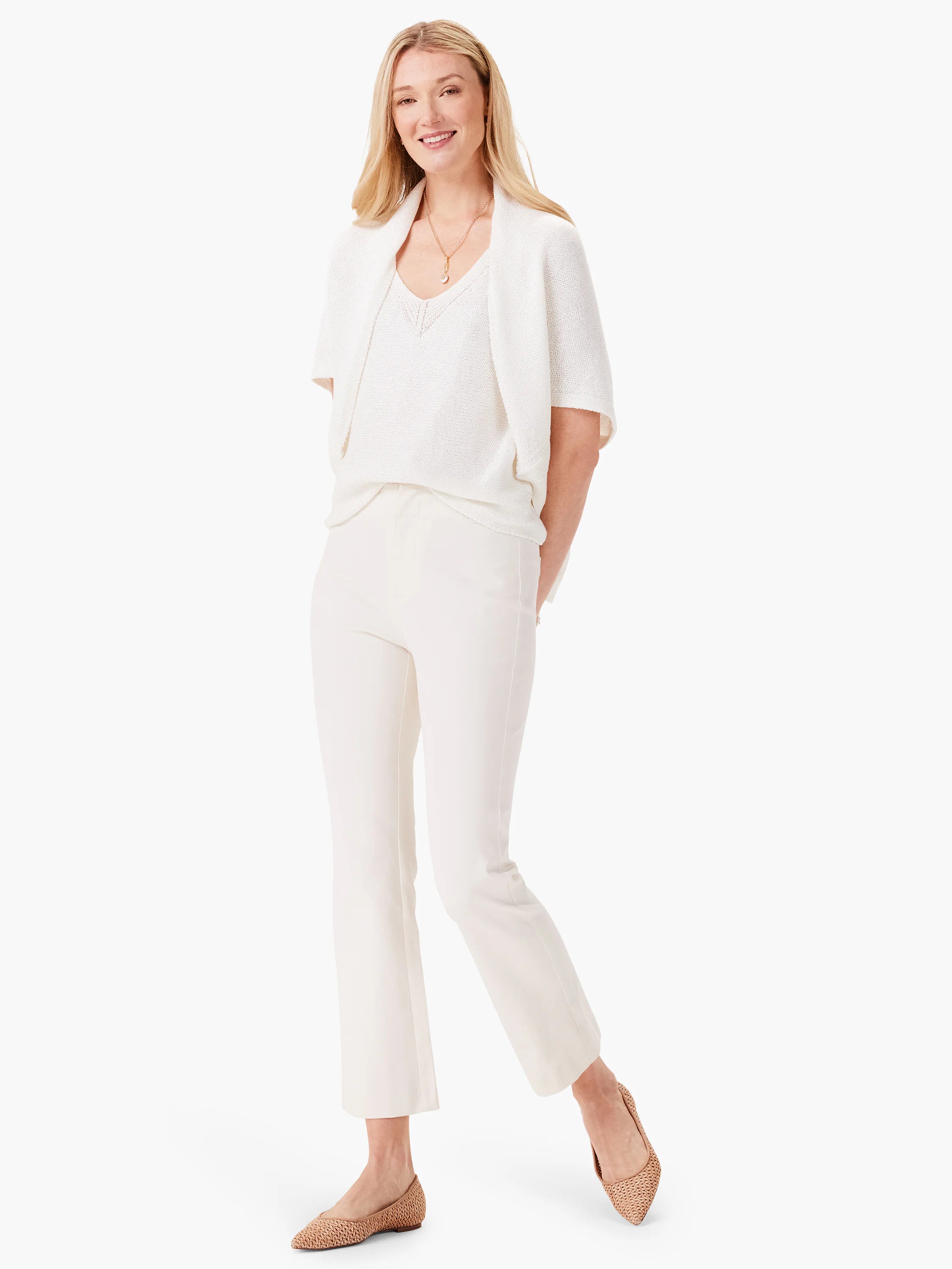 Off-white short-sleeved knit tank; textured fabric.