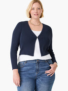 Navy blue ribbed knit cardigan, cropped length, single button closure.