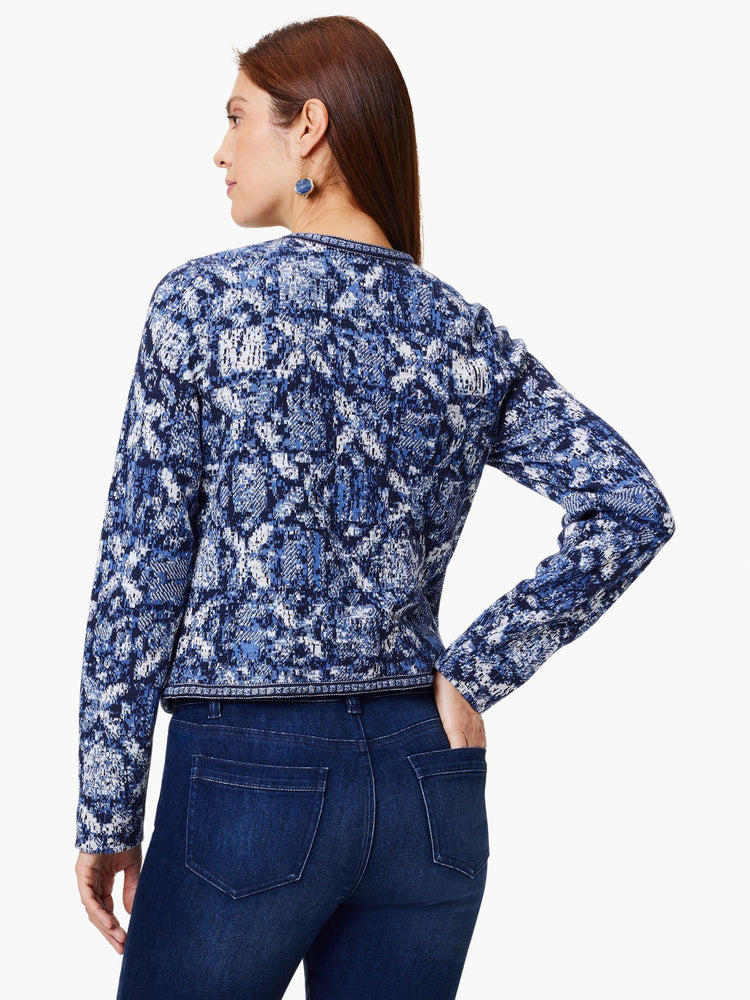 Indigo Geo Knit Jacket: Rear view. Blue and white geometric knit pattern, long sleeves, cropped length.