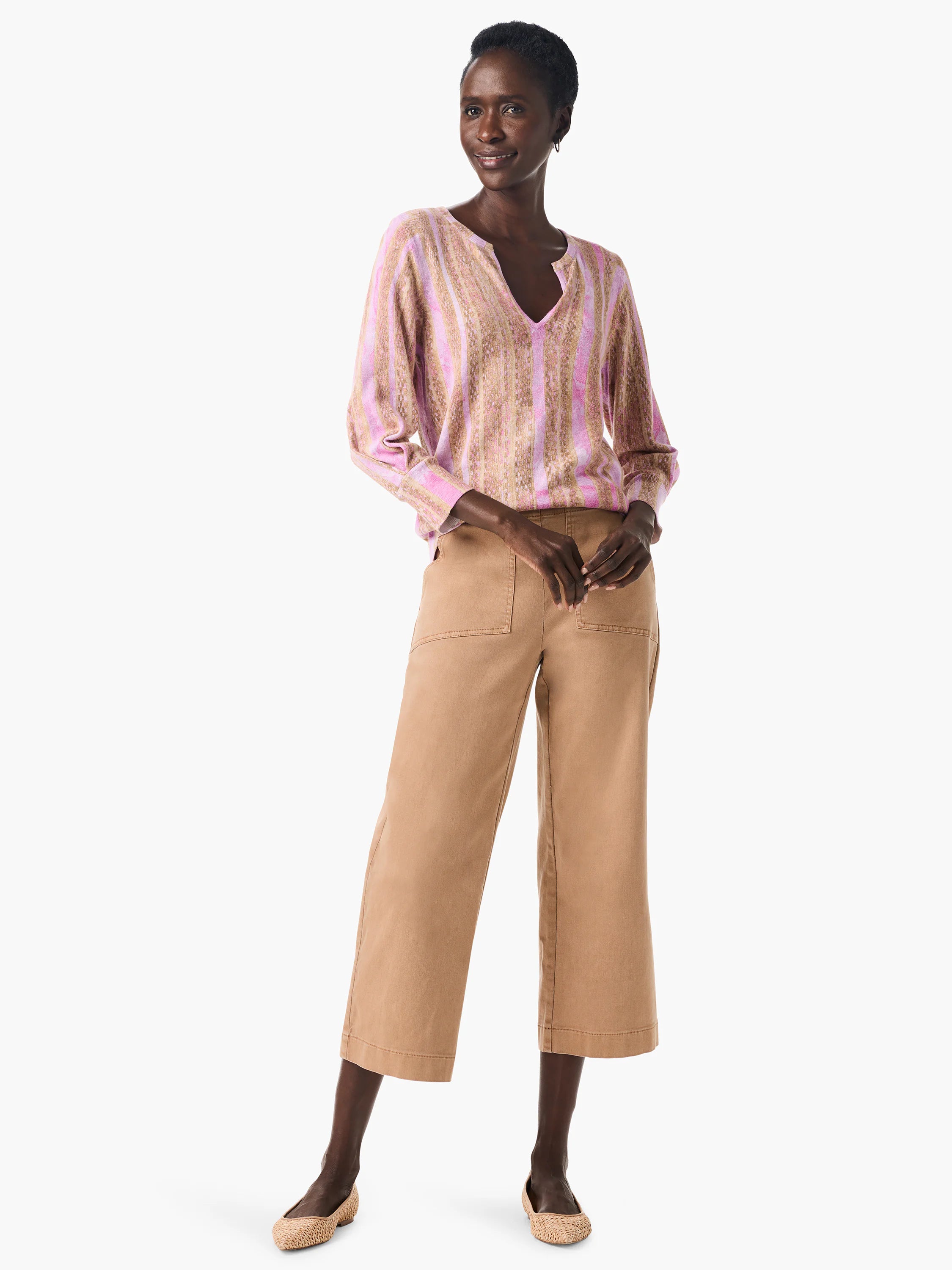 Pink and tan striped long-sleeve V-neck sweater.