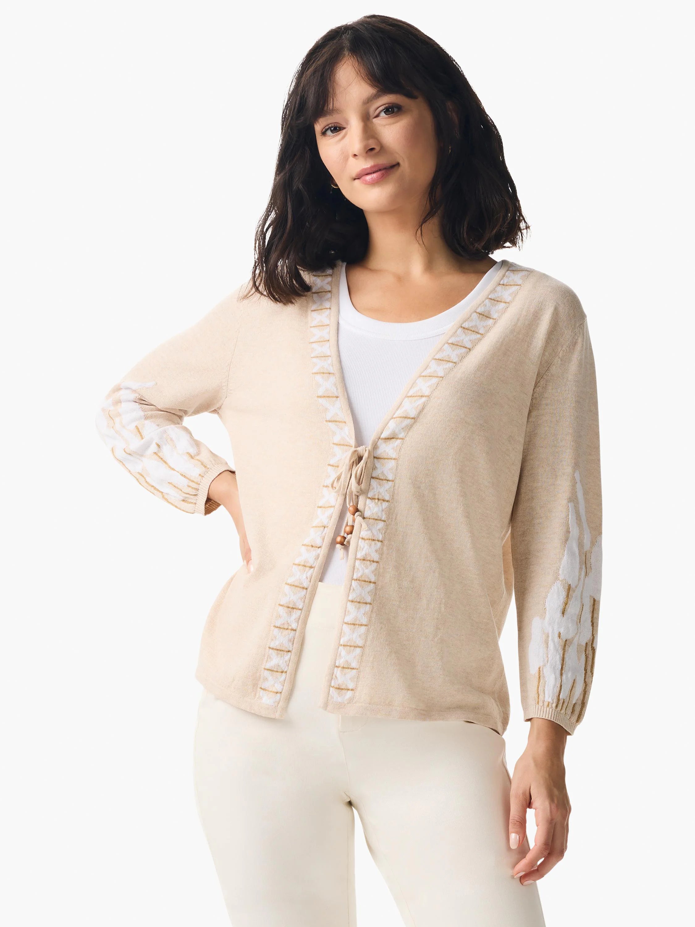Beige cardigan with white and gold embroidered details on sleeves and front. Tie closure.