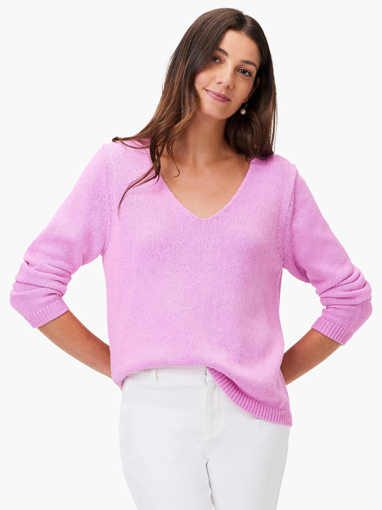 Lavender V-neck sweater with fine knit texture and long sleeves.