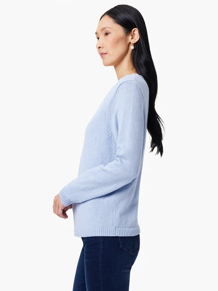 Light blue knitted V-neck sweater with long sleeves, ribbed cuffs and hem.