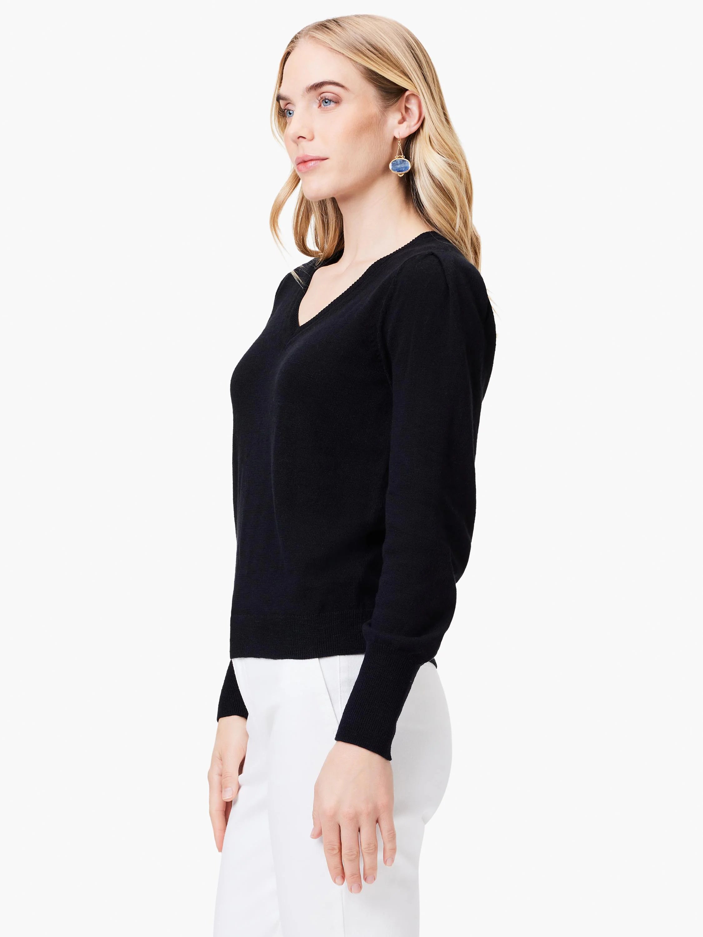 Black slub knit V-neck sweater, long sleeves, shown on a model.