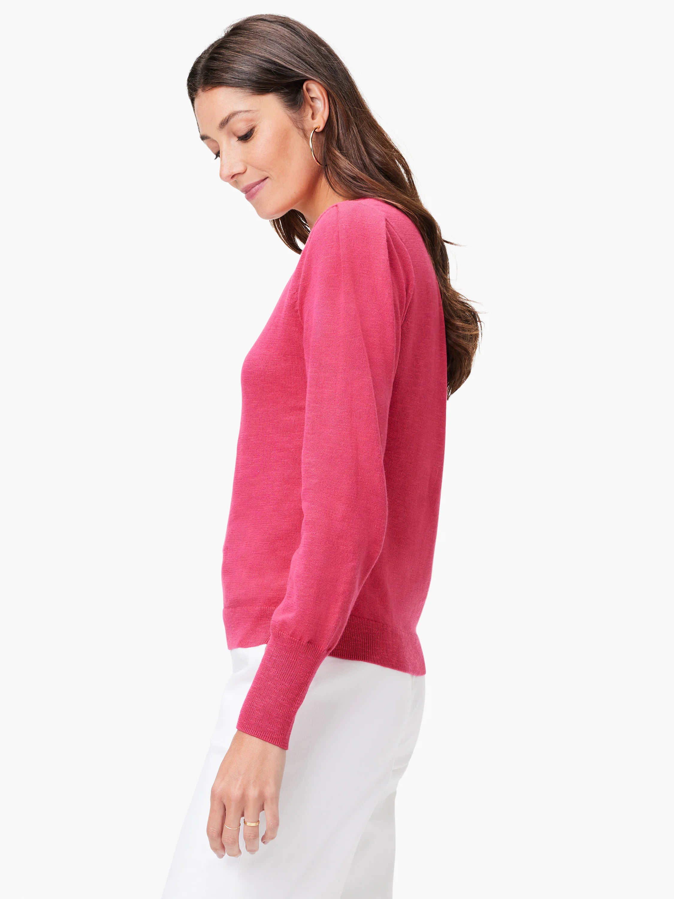 Pink slub V-neck sweater, long sleeves, and a relaxed fit.