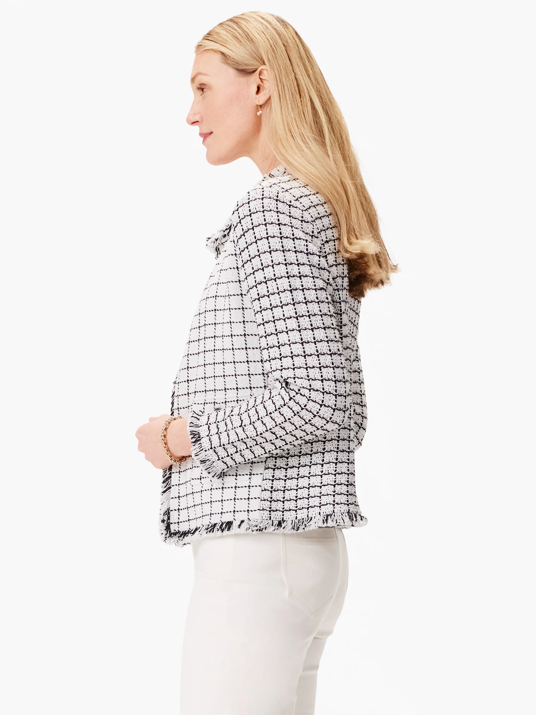 White jacket with black grid pattern and frayed edges.