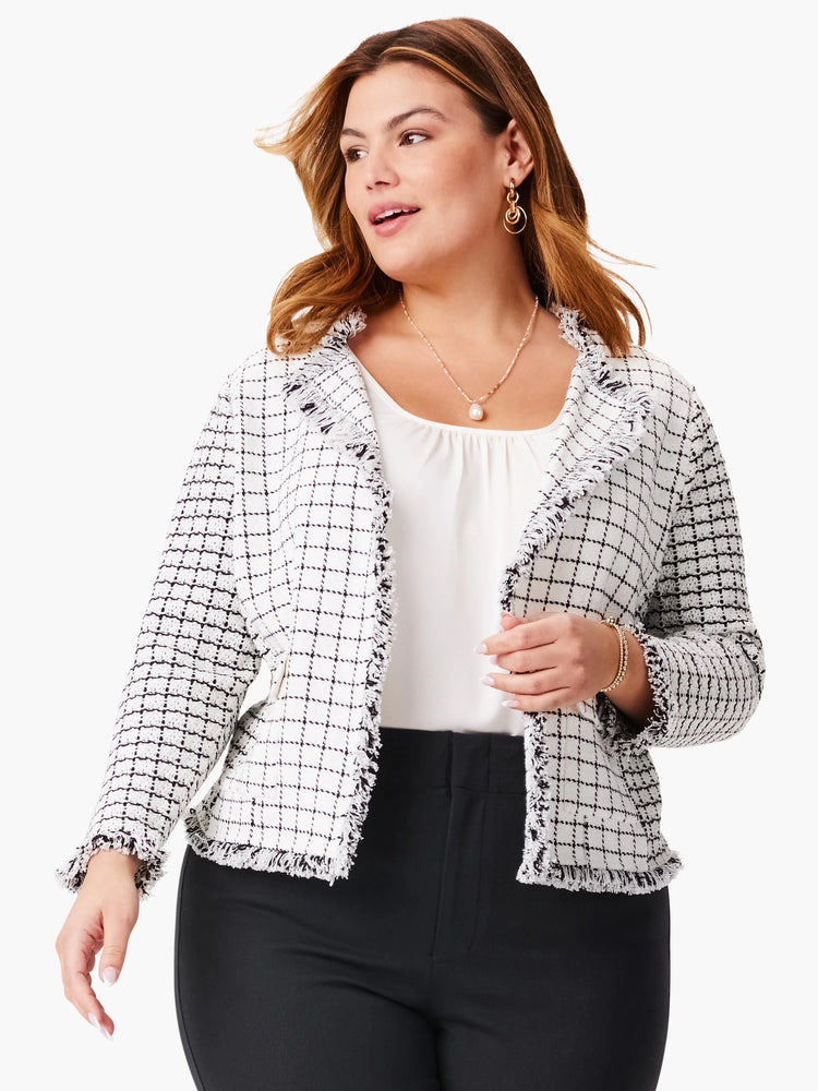 Off-white jacket with black grid pattern and frayed edges. Pockets visible.