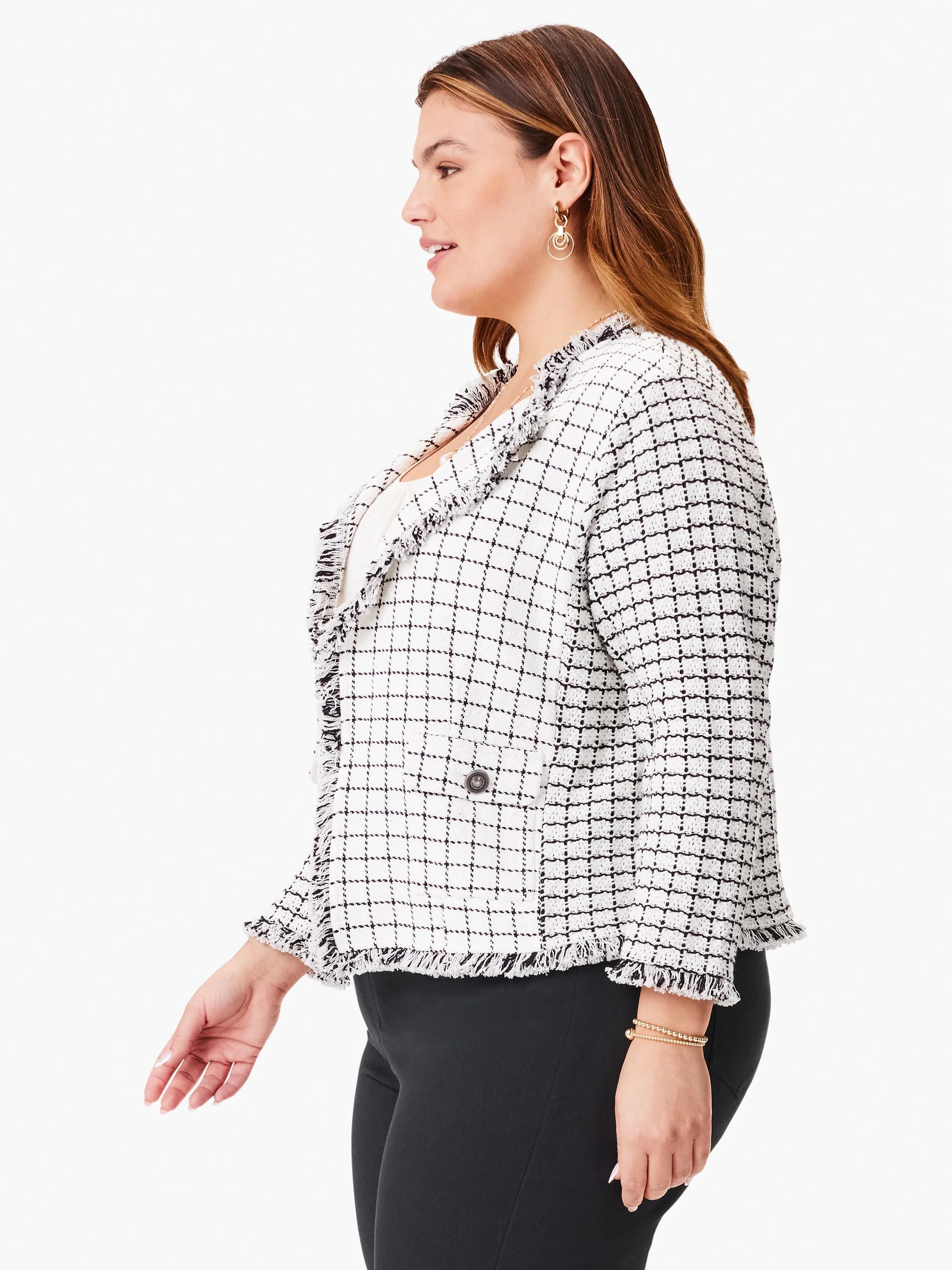 Off-white jacket with black grid pattern and fringed edges. Features a single button pocket.