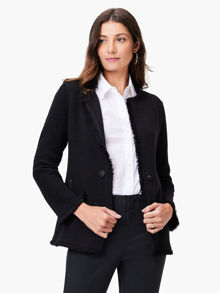 Black knit jacket with long fringe trim. Single button closure.