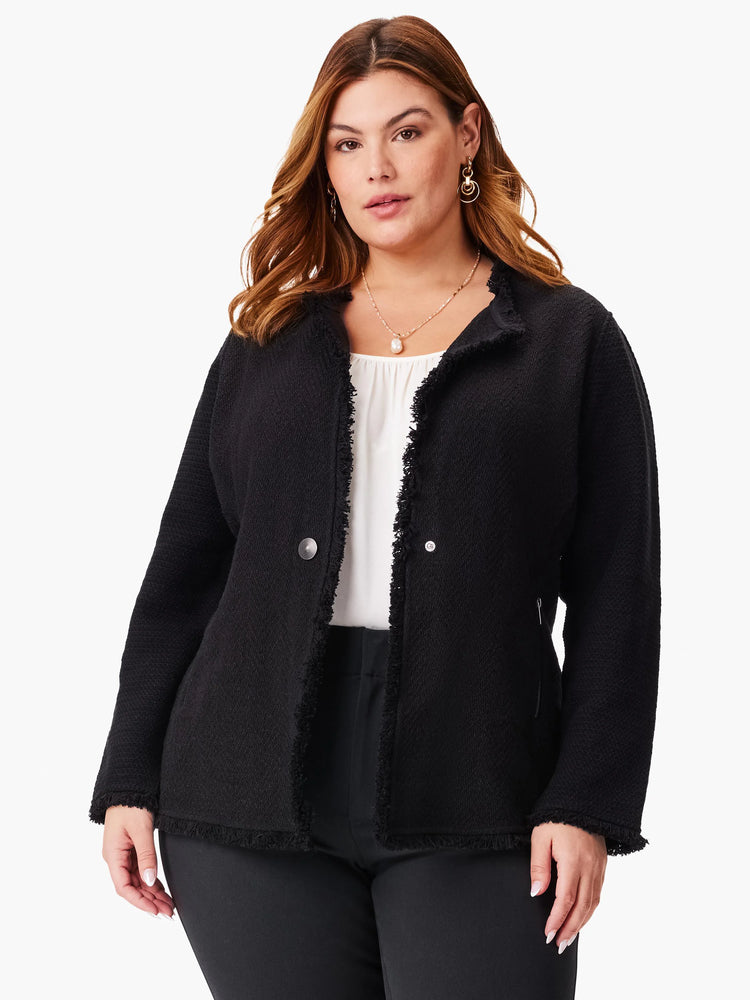 Black knit jacket with long fringe trim along the edges. Features a textured weave and a button front.