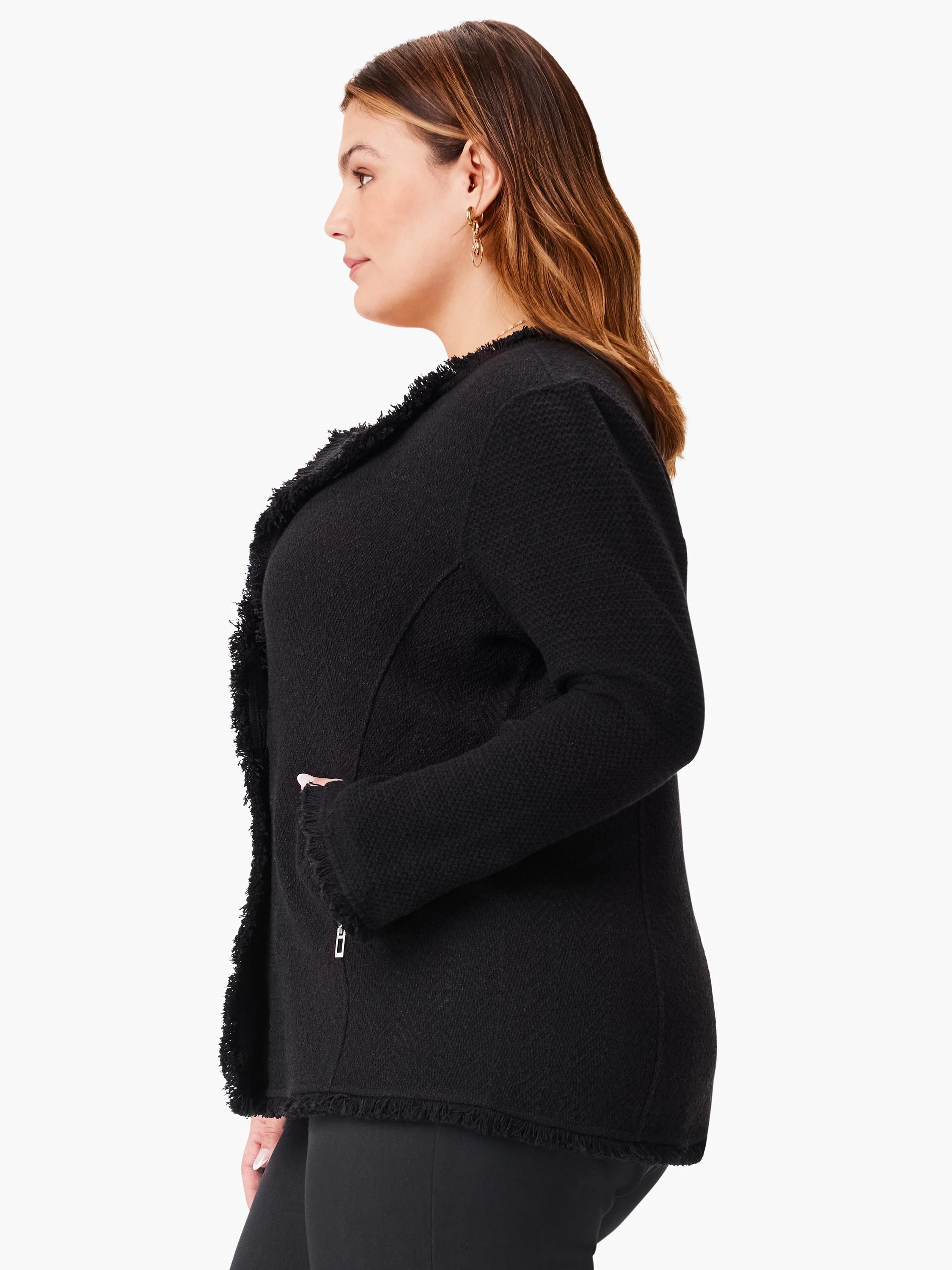 Black knit jacket with long fringe trim along the edges. Features a zipper.