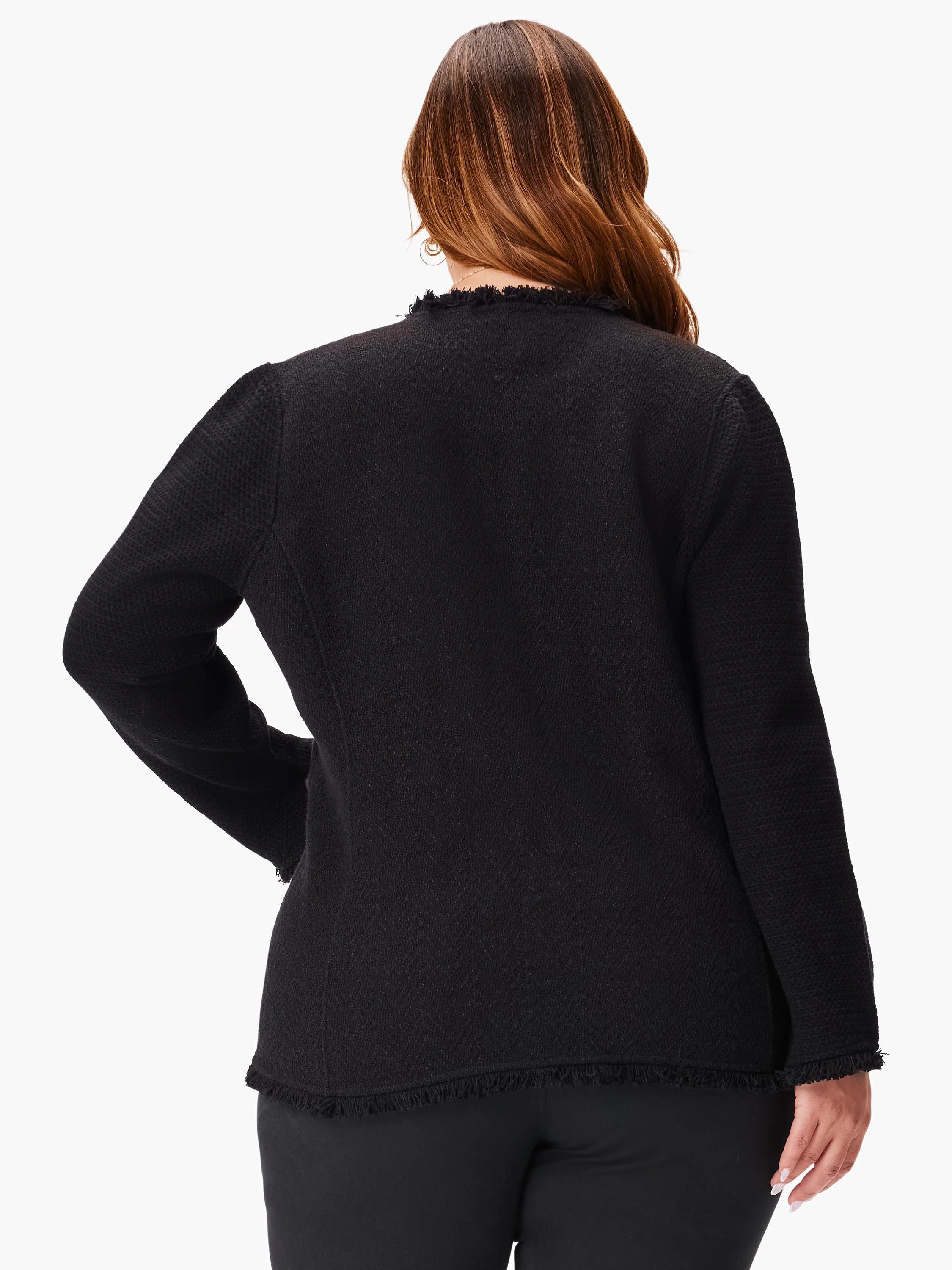 Black knit jacket, long sleeves, textured fabric, frayed hem and cuffs.