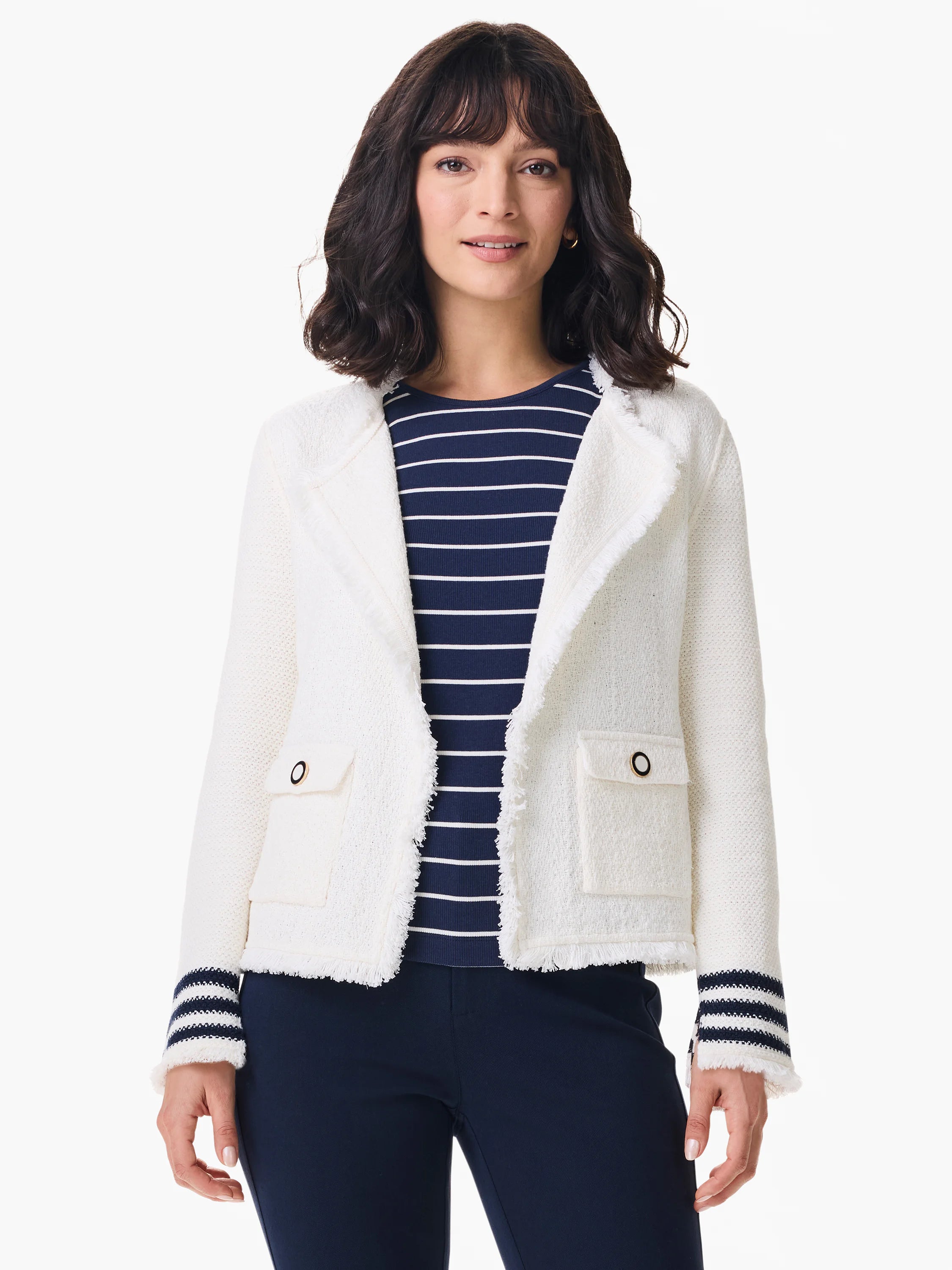 Off-white knit jacket with fringe trim. Features navy blue stripes on cuffs and subtle texture. Small gold buttons on...