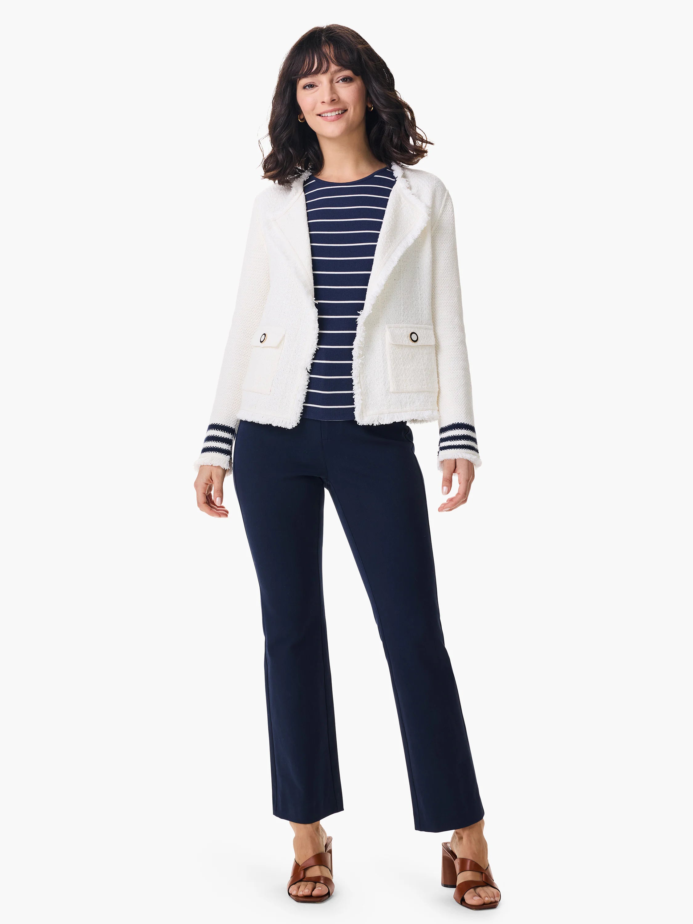 Off-white fringe knit jacket with navy blue striped cuffs and pockets. Gold buttons.