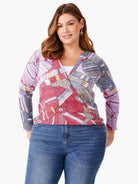 Here's alt text for the image, under 125 characters:
4-way cardigan with abstract floral mosaic print in pinks, reds,...