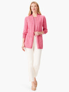 Pink open-front cardigan, speckled texture, three-quarter sleeves, shown on a model.