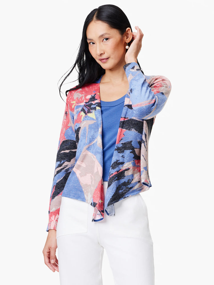 4-way cardigan in blue, pink, and gray abstract print. Open front, asymmetrical hem.