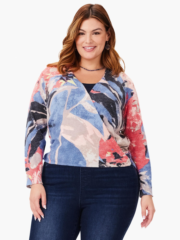 4-way cardigan with abstract blue, pink, coral, and gray print. Long sleeves, wrap style.