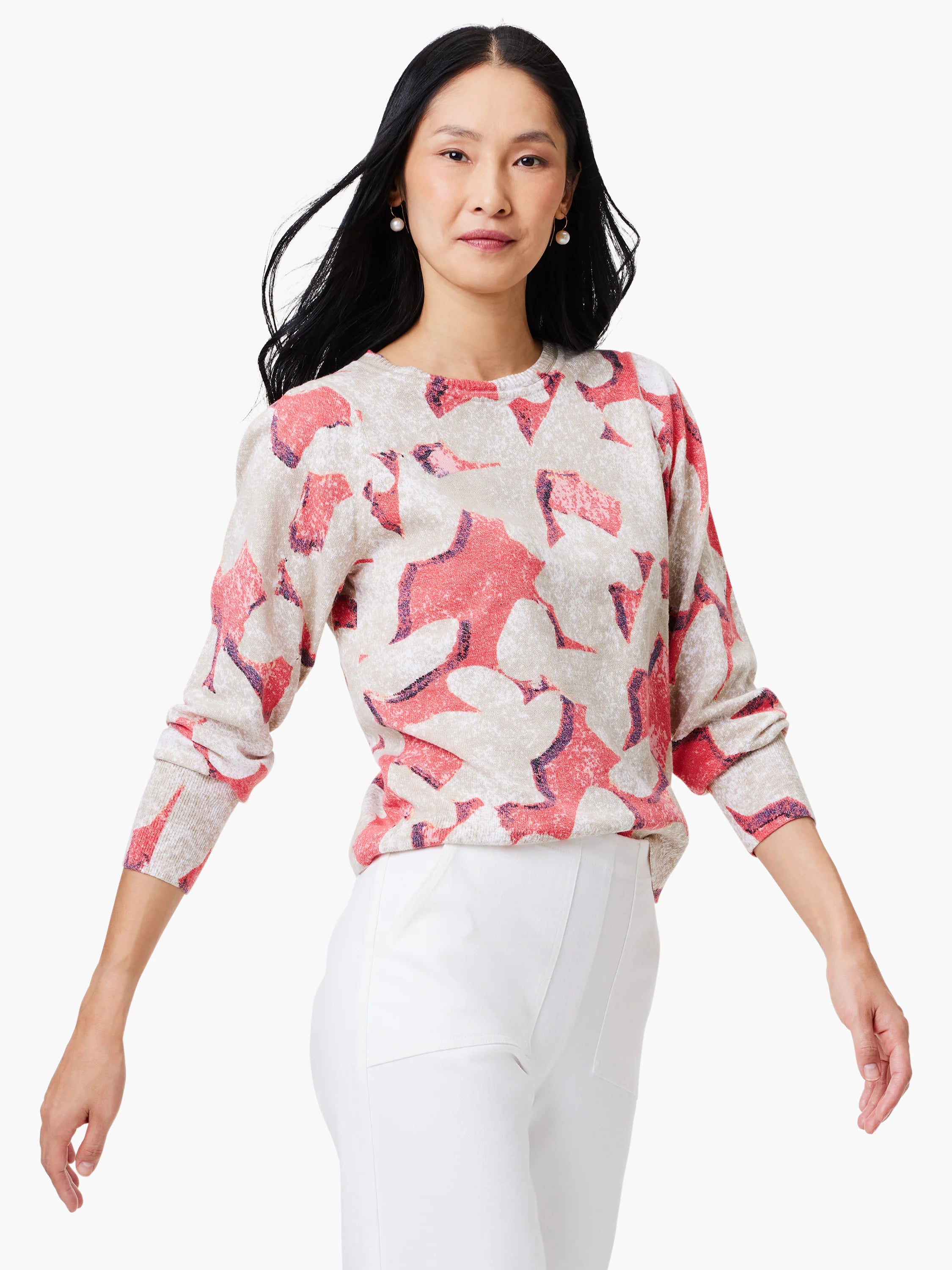 Beige sweater with coral and maroon abstract print. Long sleeves, crew neck.