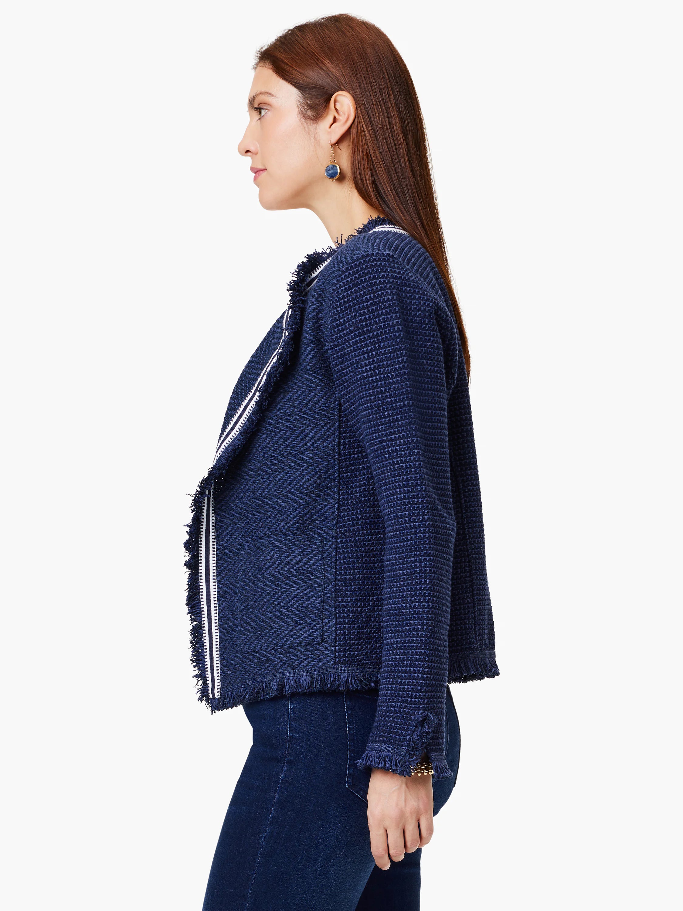 Navy blue knit jacket with white and navy trim, textured weave, and frayed edges.