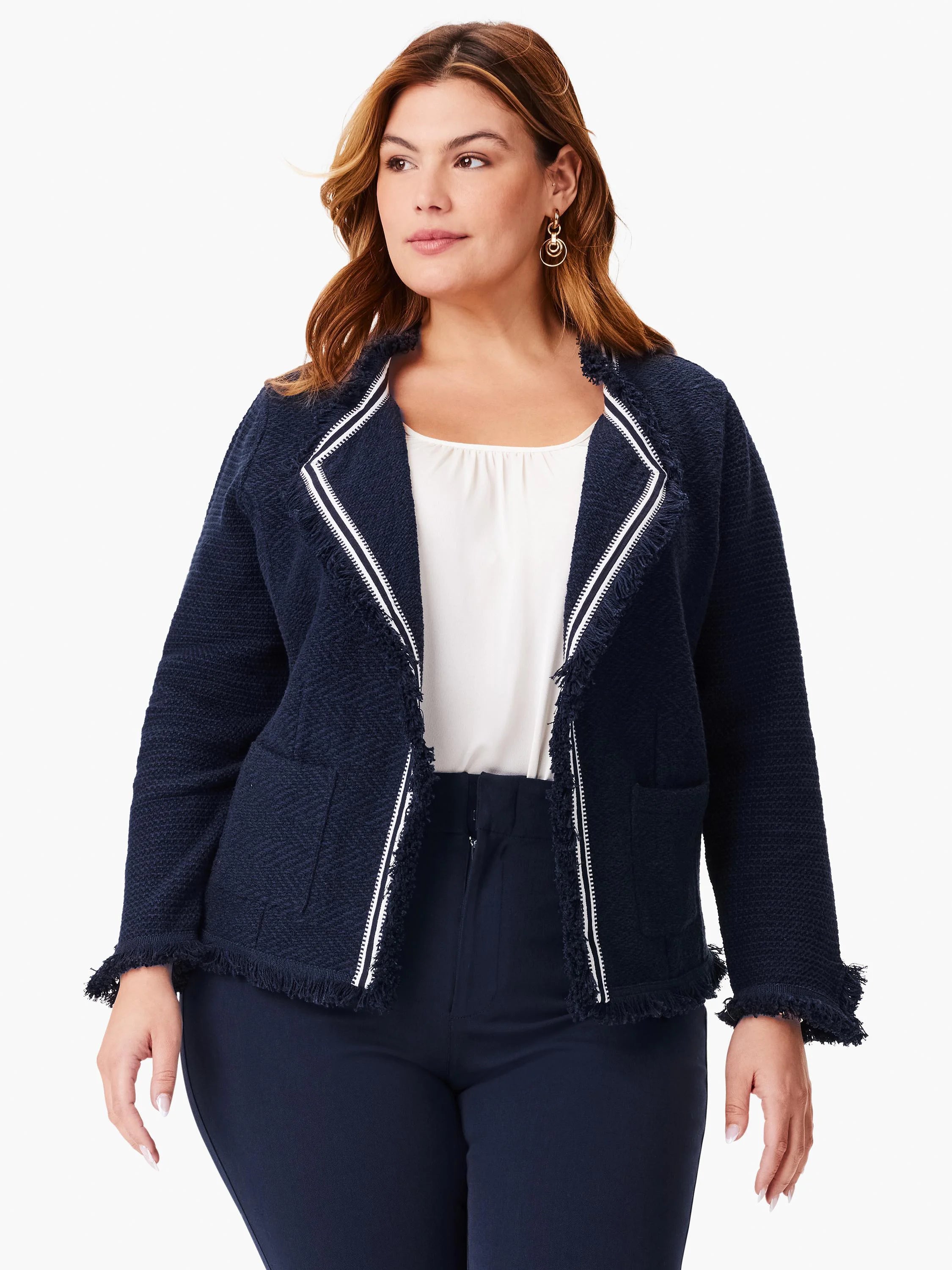 Navy blue knit jacket with white trim and fringe detailing. Open front.