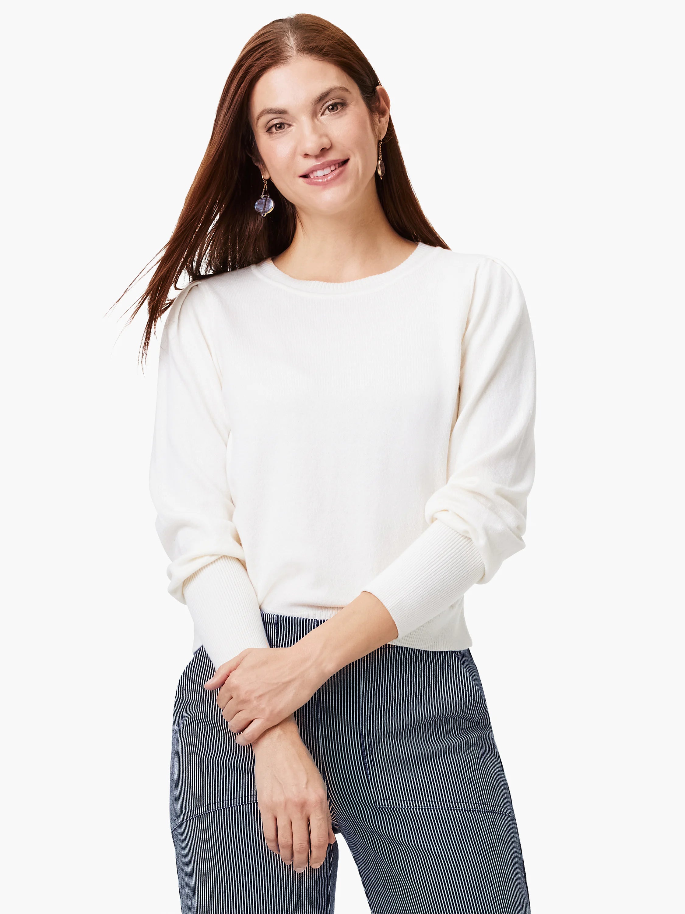 Ivory crew neck sweater with subtle puffed sleeves and ribbed cuffs, cropped at the waist.
