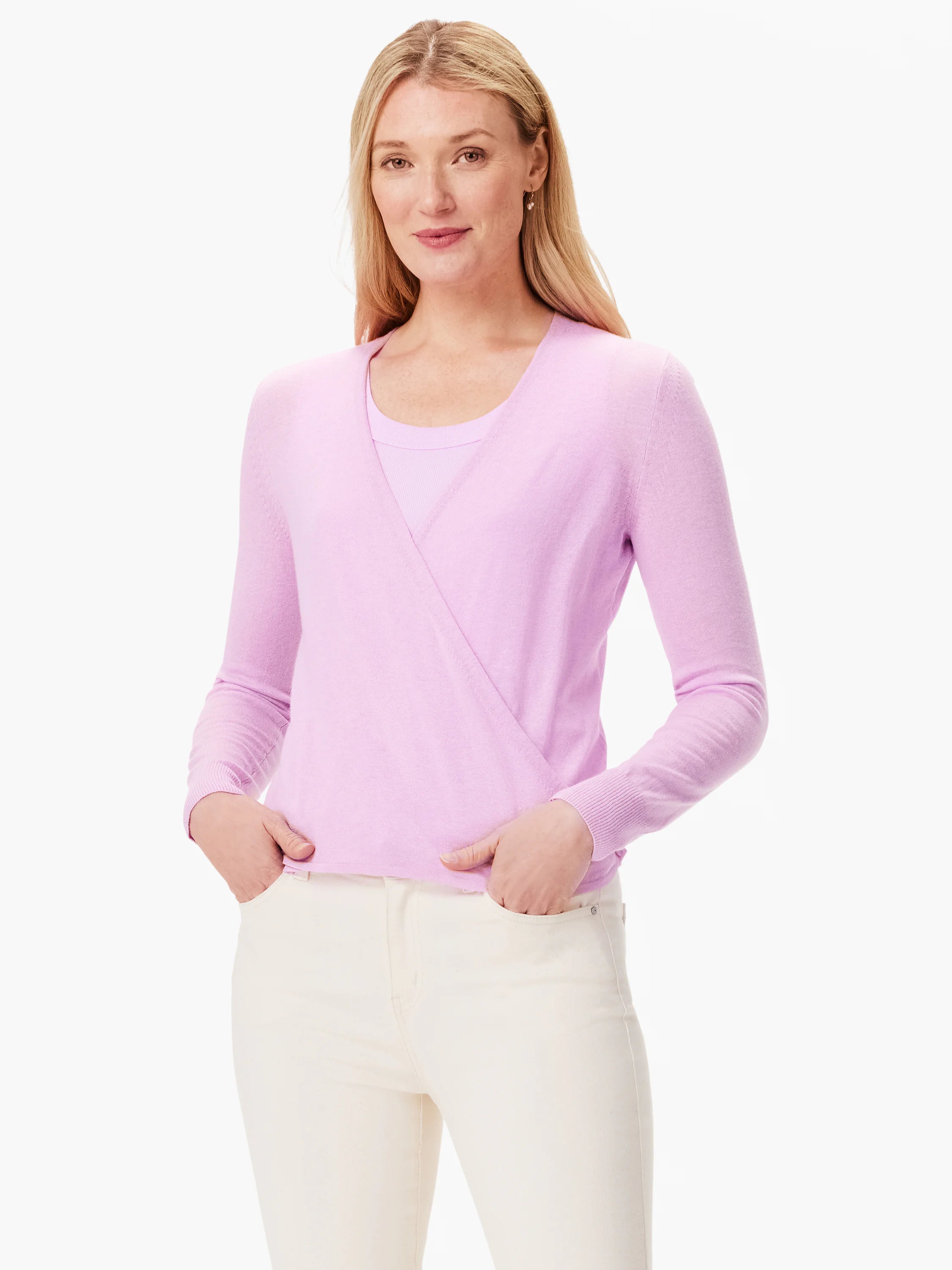 Light purple long-sleeve wrap cardigan on a woman, worn over a tonal top.