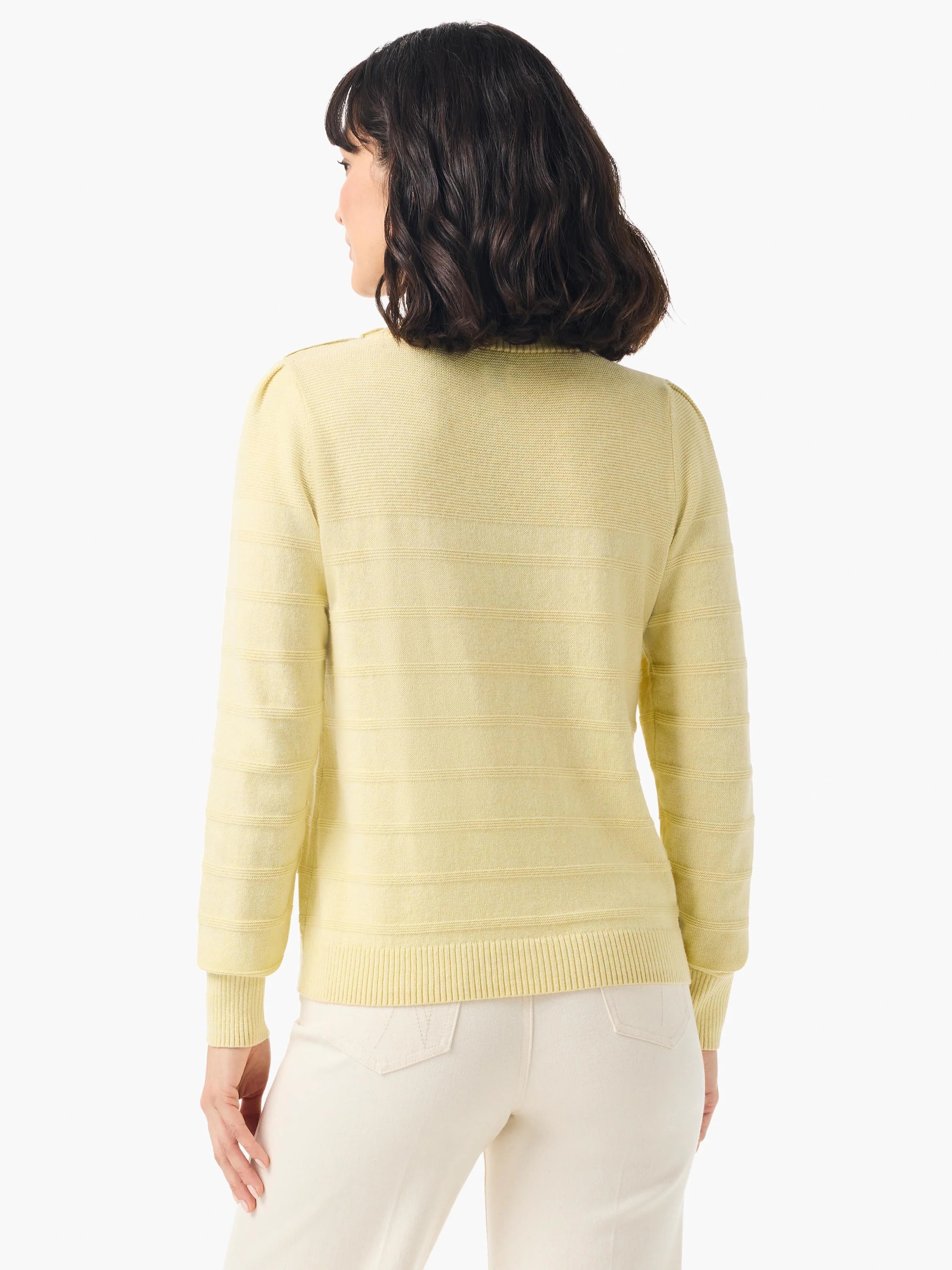 Pale yellow, ribbed cashmere sweater. Button shoulders, long sleeves. Back view.