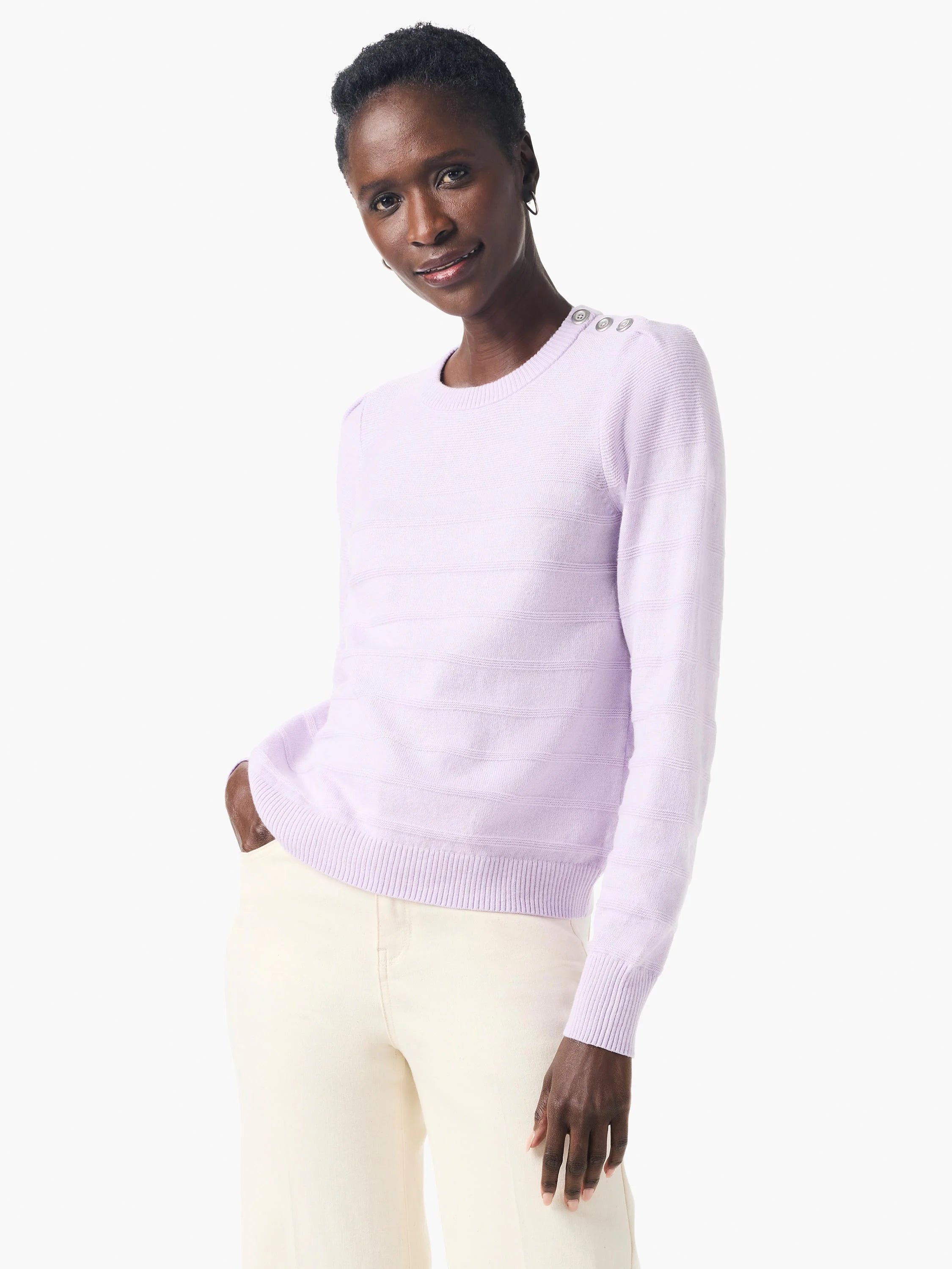 Lavender cashmere sweater with subtle horizontal ribs, round neck, and three silver buttons on each shoulder.