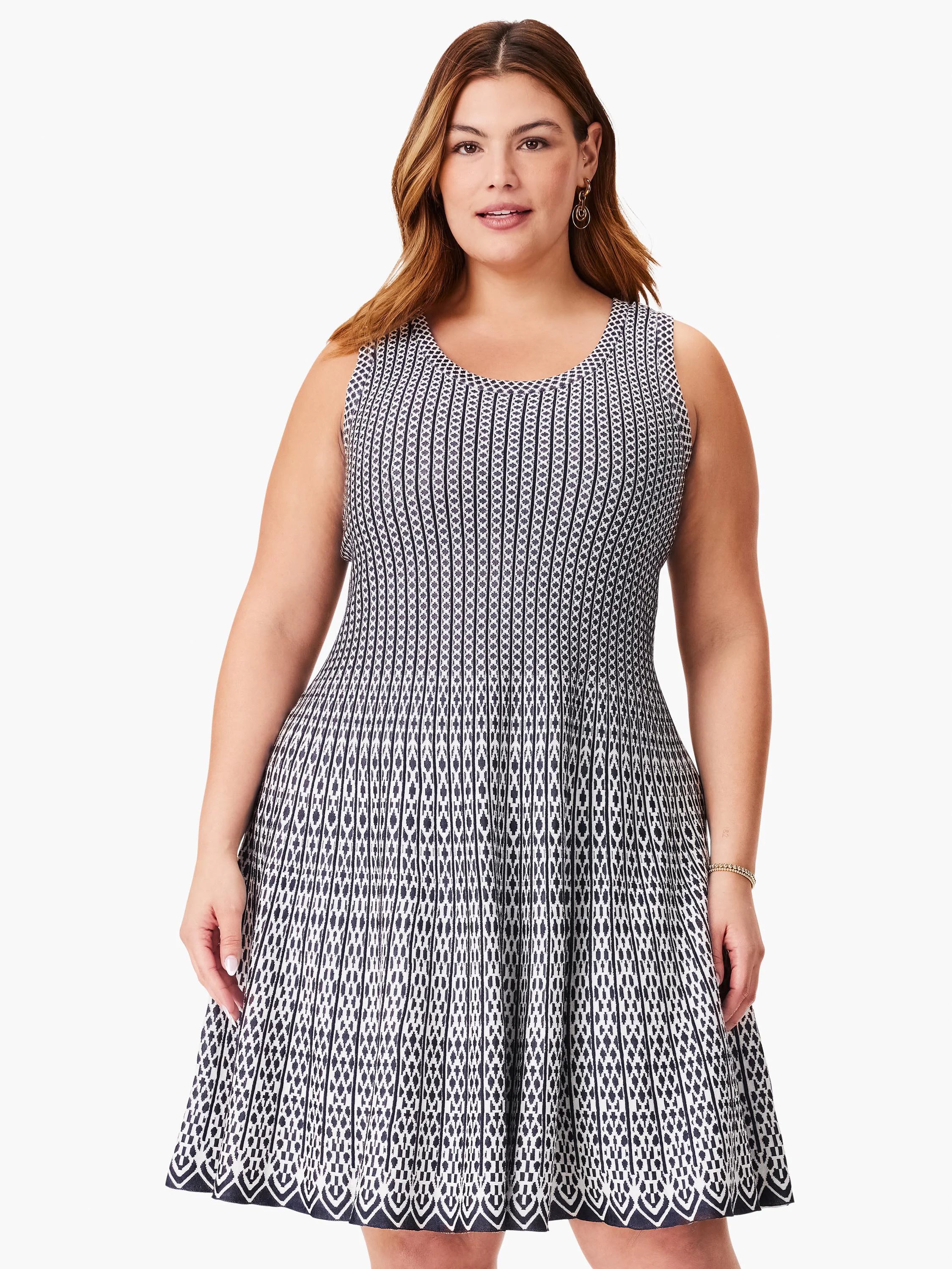 Black and white patterned fit-and-flare sleeveless dress. Geometric print. Knit fabric.