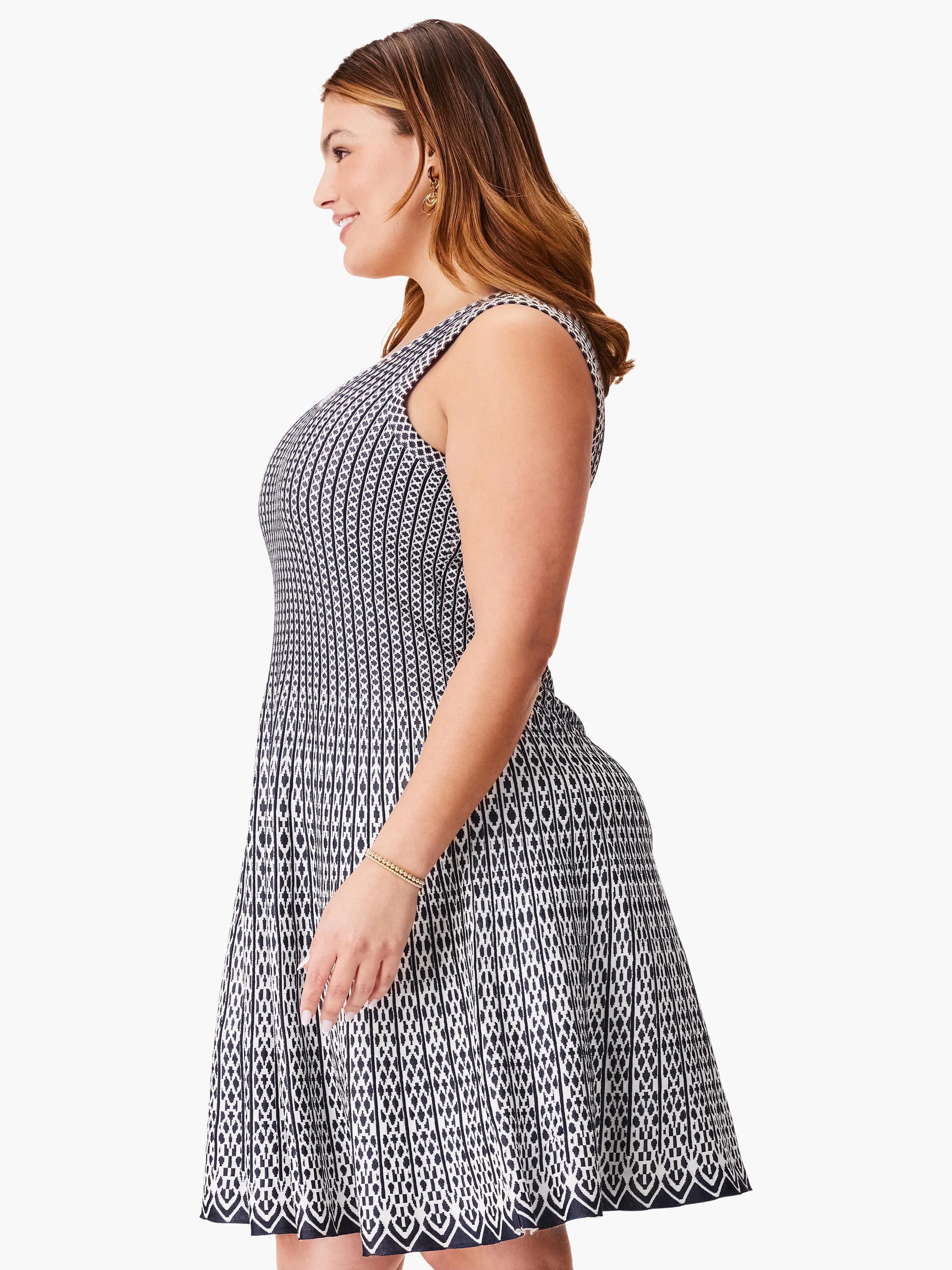 Black and white patterned sleeveless fit-and-flare dress. Geometric print.