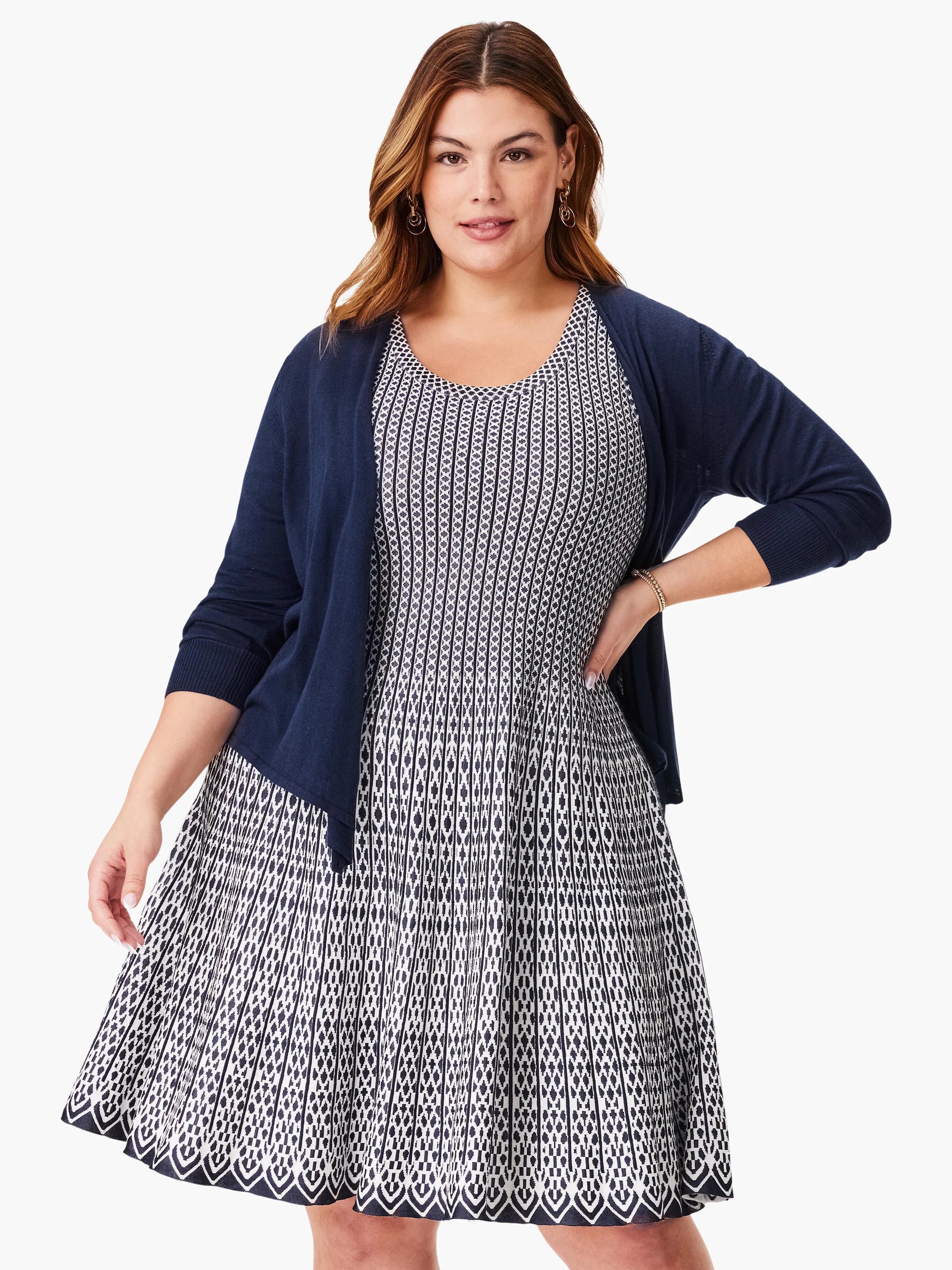 Navy blue and white patterned fit-and-flare dress. The pattern is a repeating geometric design. A matching navy...