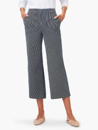 White and navy vertical stripe wide-leg jeans, cropped to mid-calf, with side pockets.