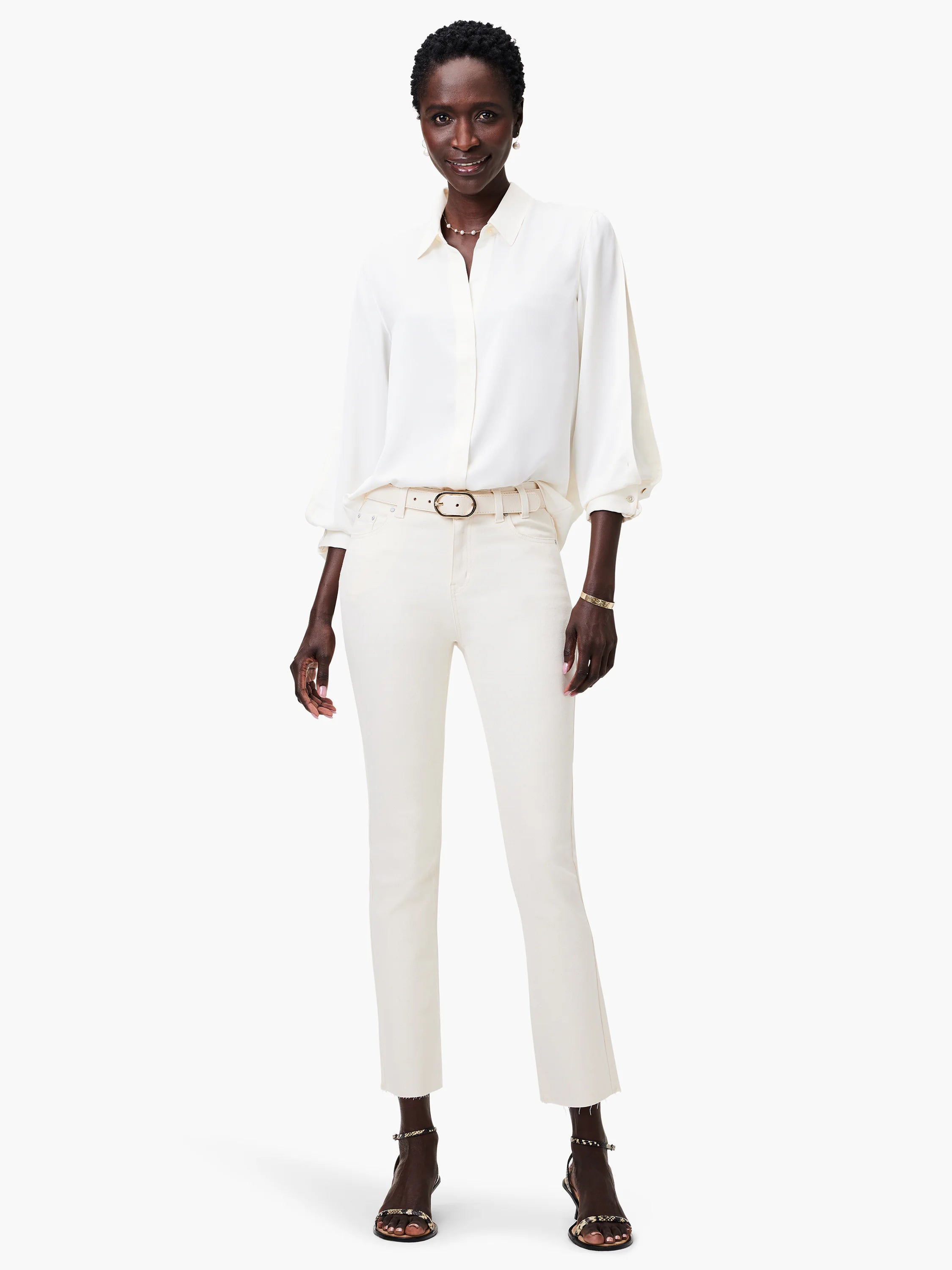 Off-white satin chiffon shirt; long sleeves with slight puff at shoulder; button-down front.