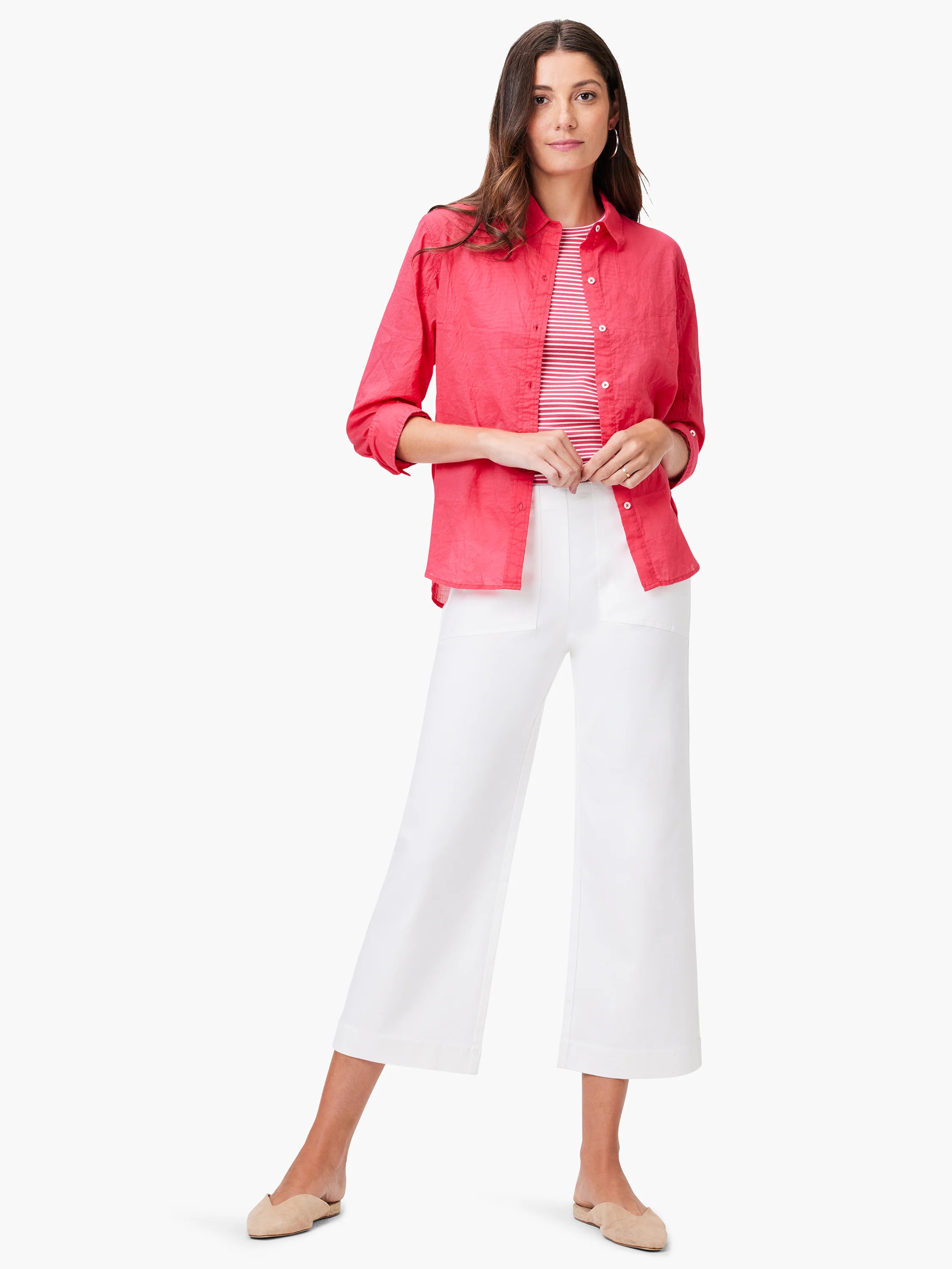 Coral, relaxed-fit button-up shirt with rolled long sleeves and a subtly crinkled texture.