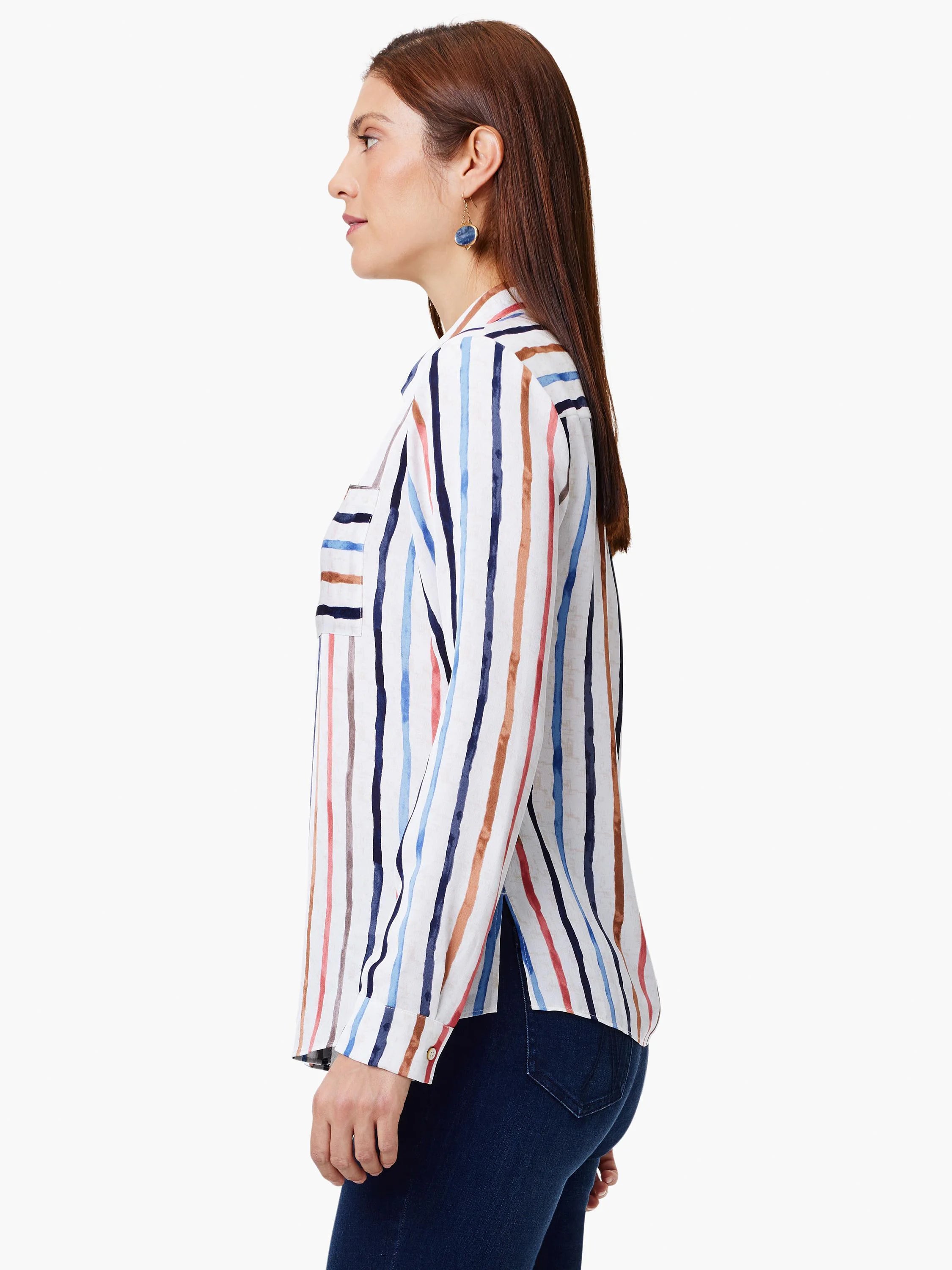 White button-up top with painted-style vertical stripes in navy, light blue, tan, and coral. Features a chest pocket.