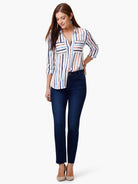 White button-down top with varied vertical stripes in blue, coral, and brown.