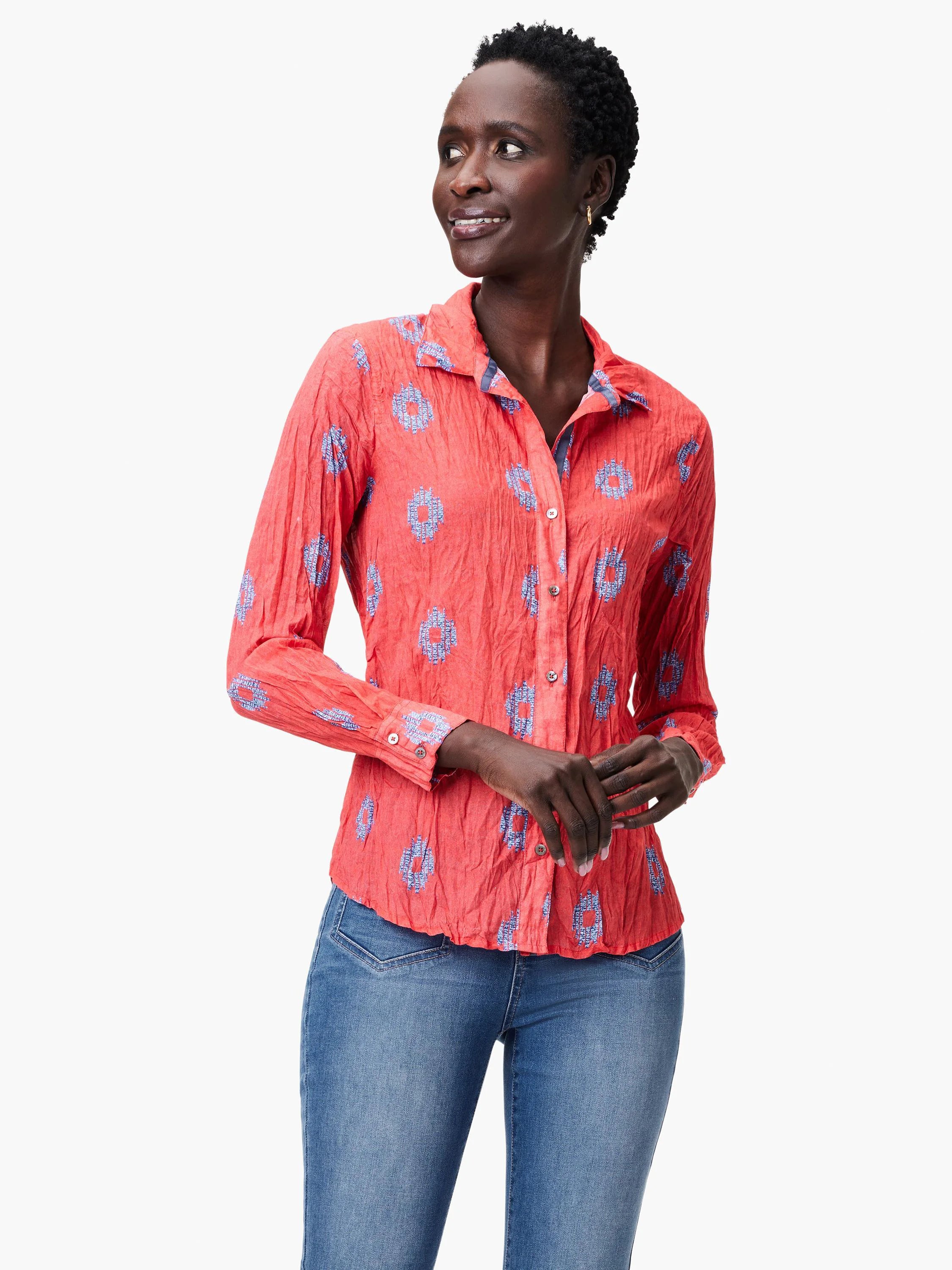 Coral crinkled long-sleeve button-down shirt with a blue geometric pattern.