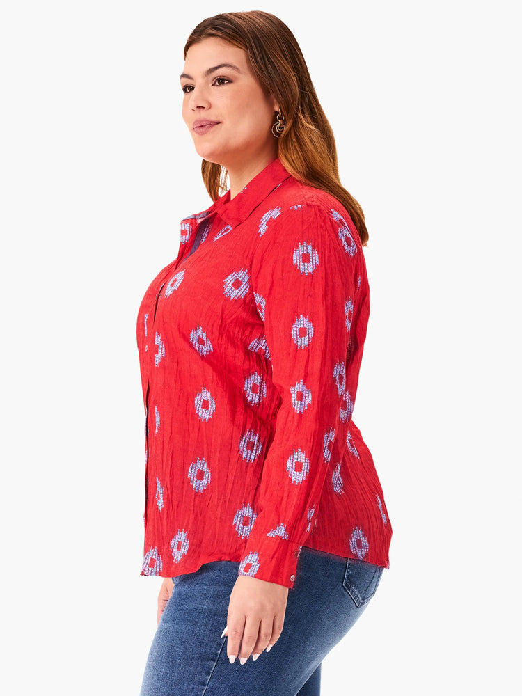 Red long-sleeve shirt with a crinkled texture and a light blue geometric pattern. Button front.