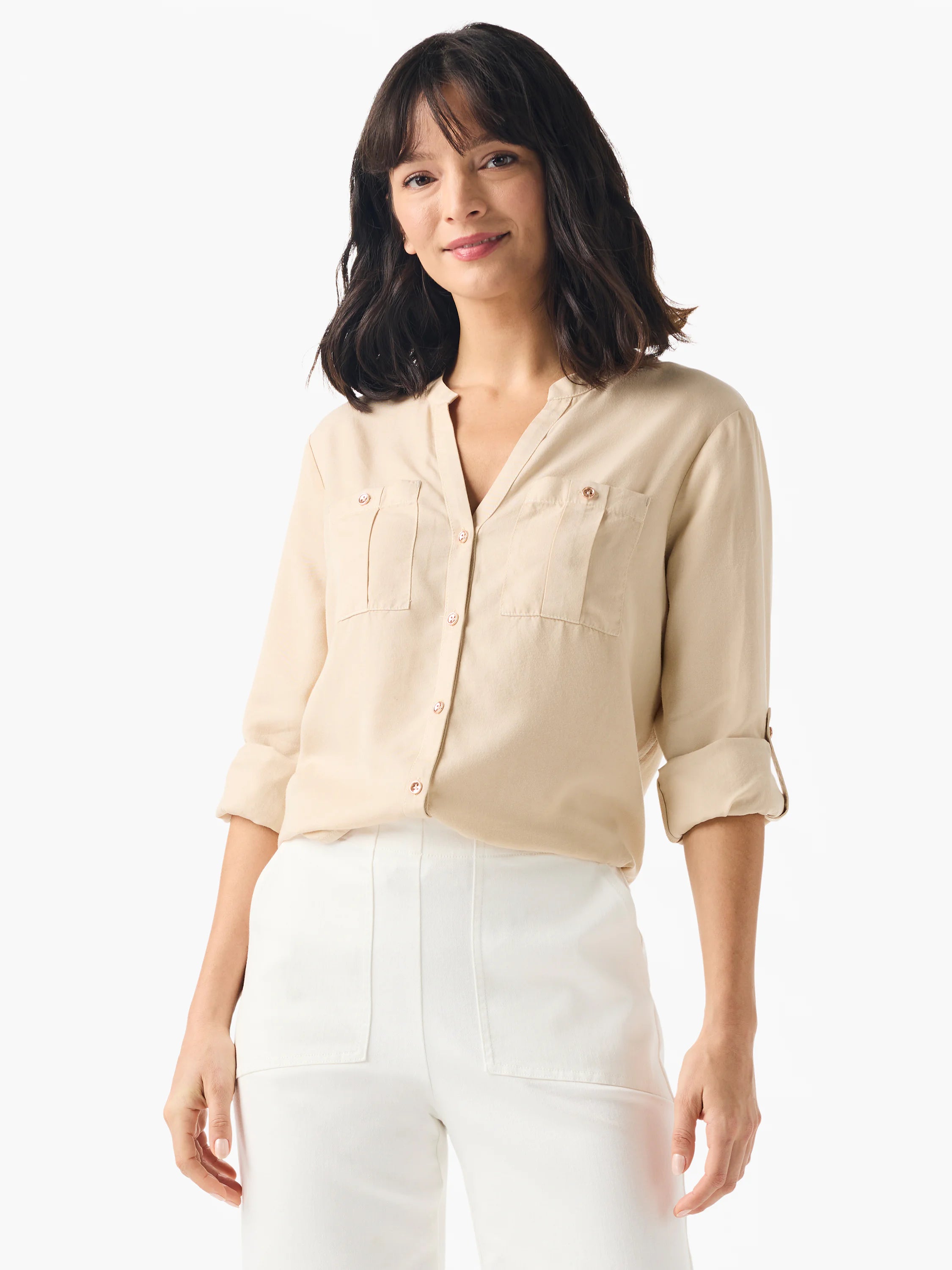 Beige, long-sleeve button-down shirt; two chest pockets; rolled cuffs.