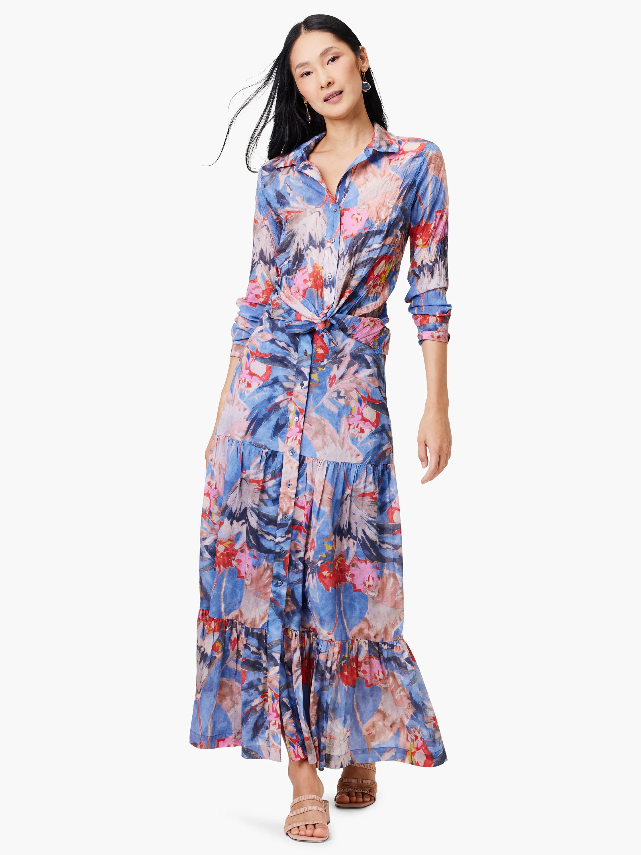 Blue, pink, and red floral print long-sleeved shirt and maxi skirt. Shirt is tied at waist. Crinkled fabric.