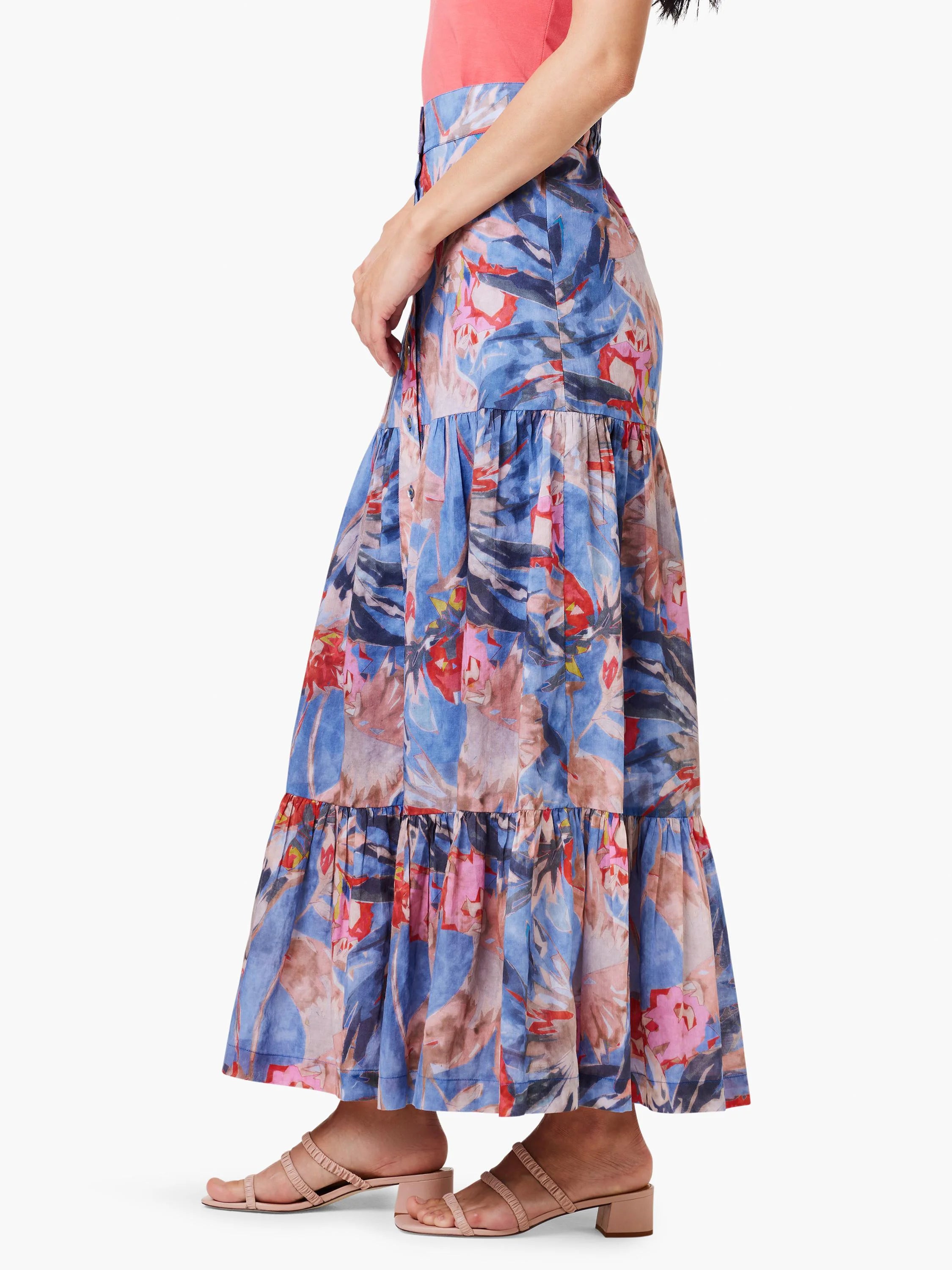 Blue tiered maxi skirt with red, pink & beige abstract floral print. Button front.