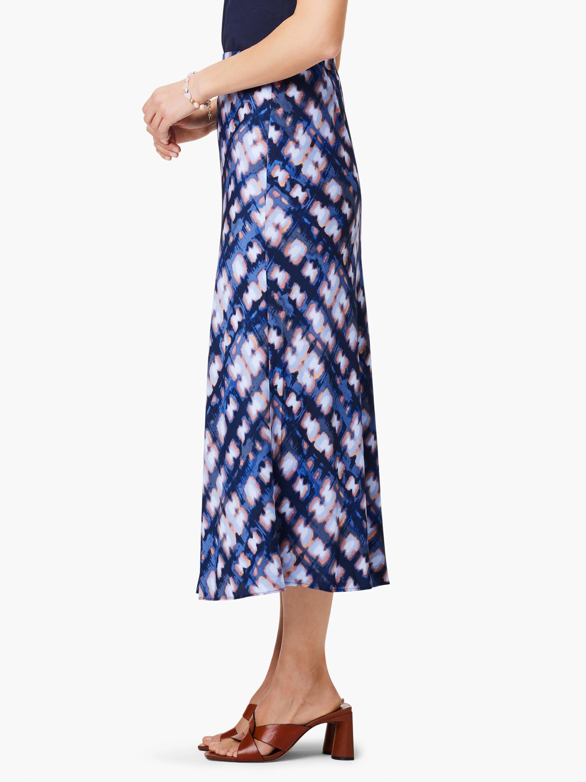 Midi slip skirt, blue, lavender, and peach tie-dye pattern. A-line silhouette.