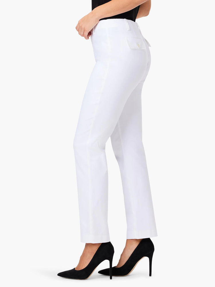 White straight-leg pants; back pocket detail; shown on model with black heels.