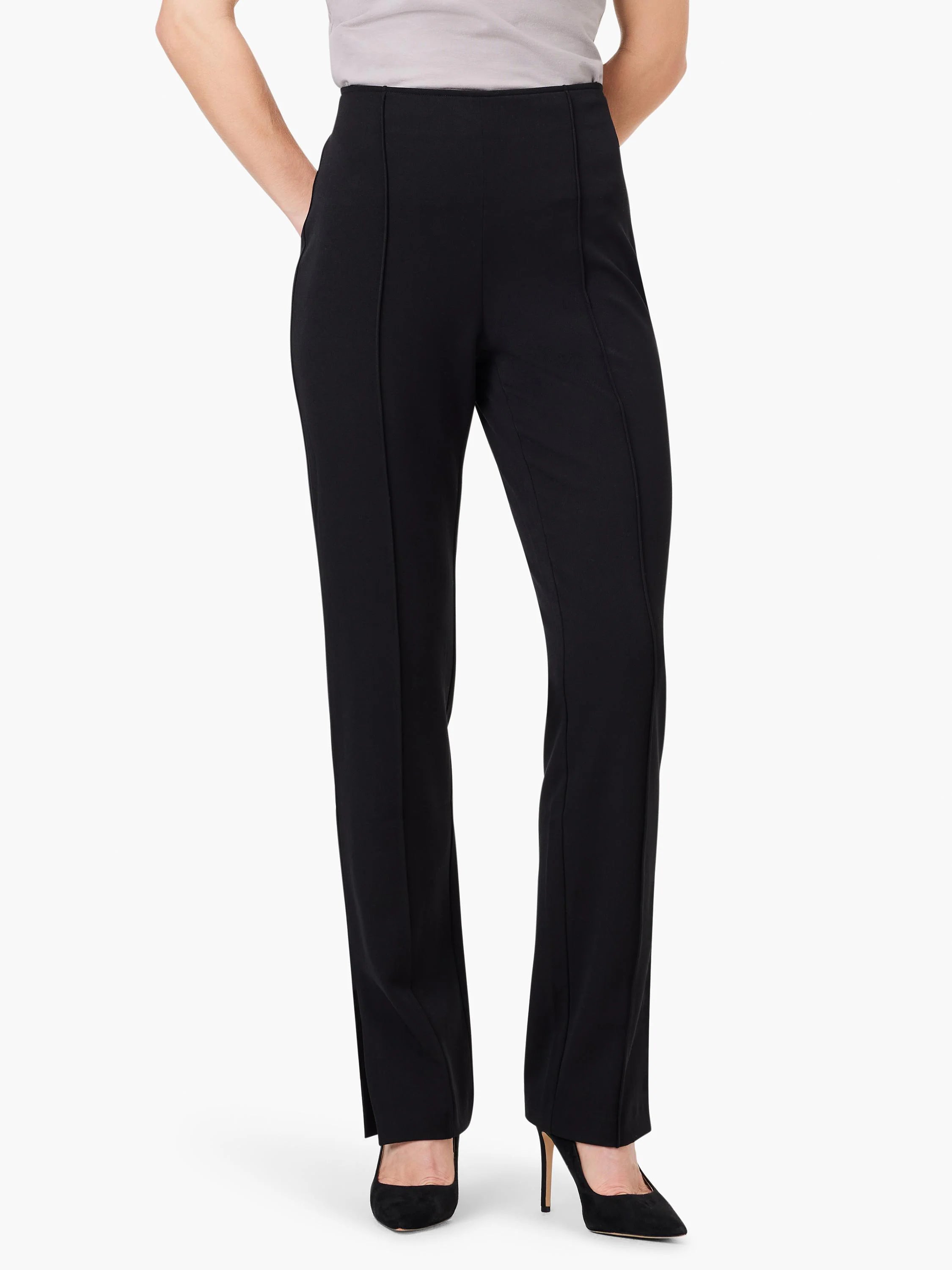 Black straight-leg pants with side slits, shown on a model.  Features center creases and pockets.