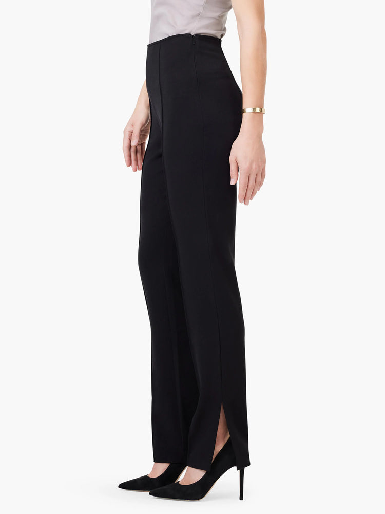 Black straight-leg pants with side slits, shown on a model. The pants appear to have a high waist.
